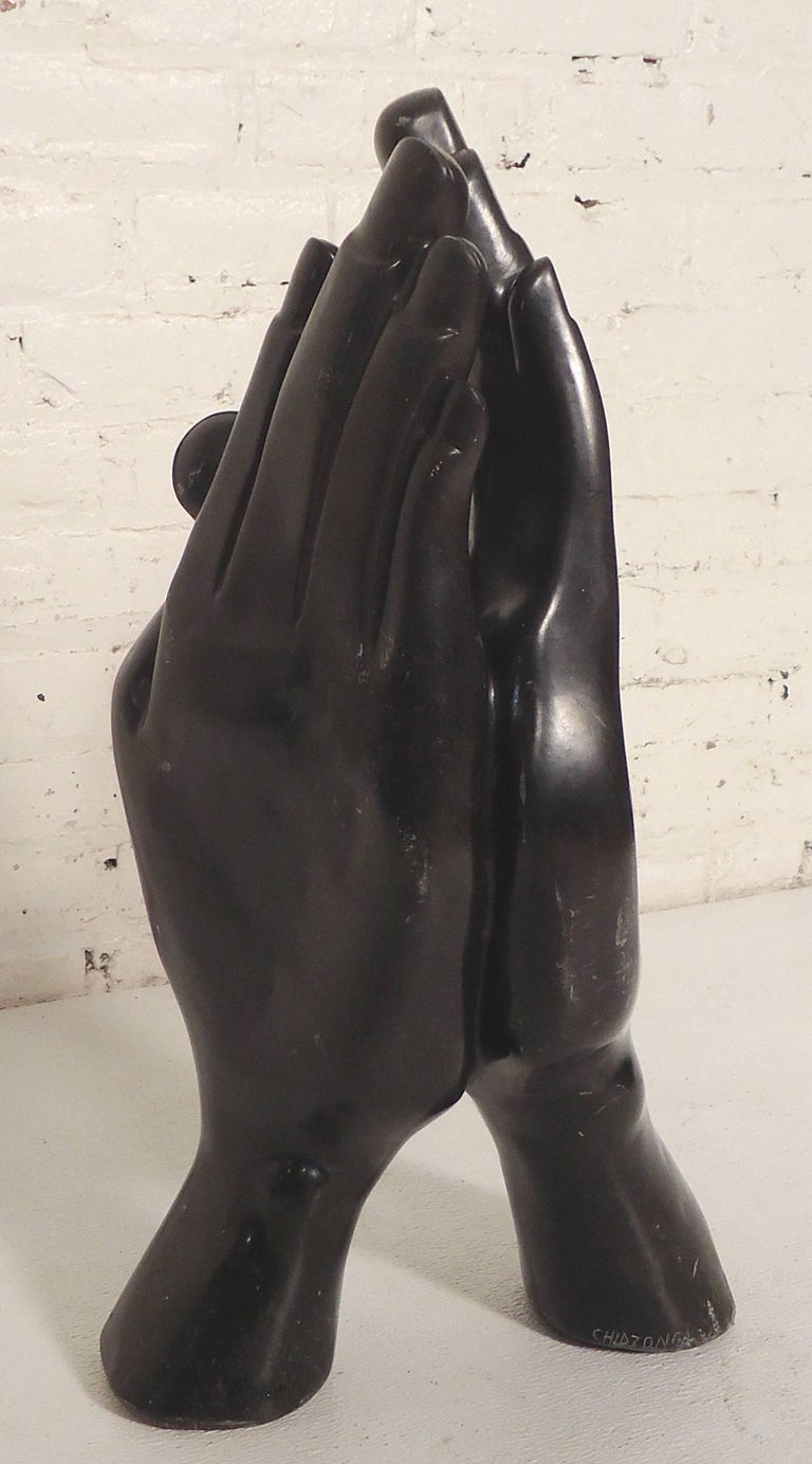 Beautiful black marble praying hands made by Zimbabwe artist Peter Chidzonga. Peter's work has been shown in galleries in Canada, UK, USA, The Netherlands, France and others, as well as at the prestigious Chapungu Gallery in Harare.

(Please
