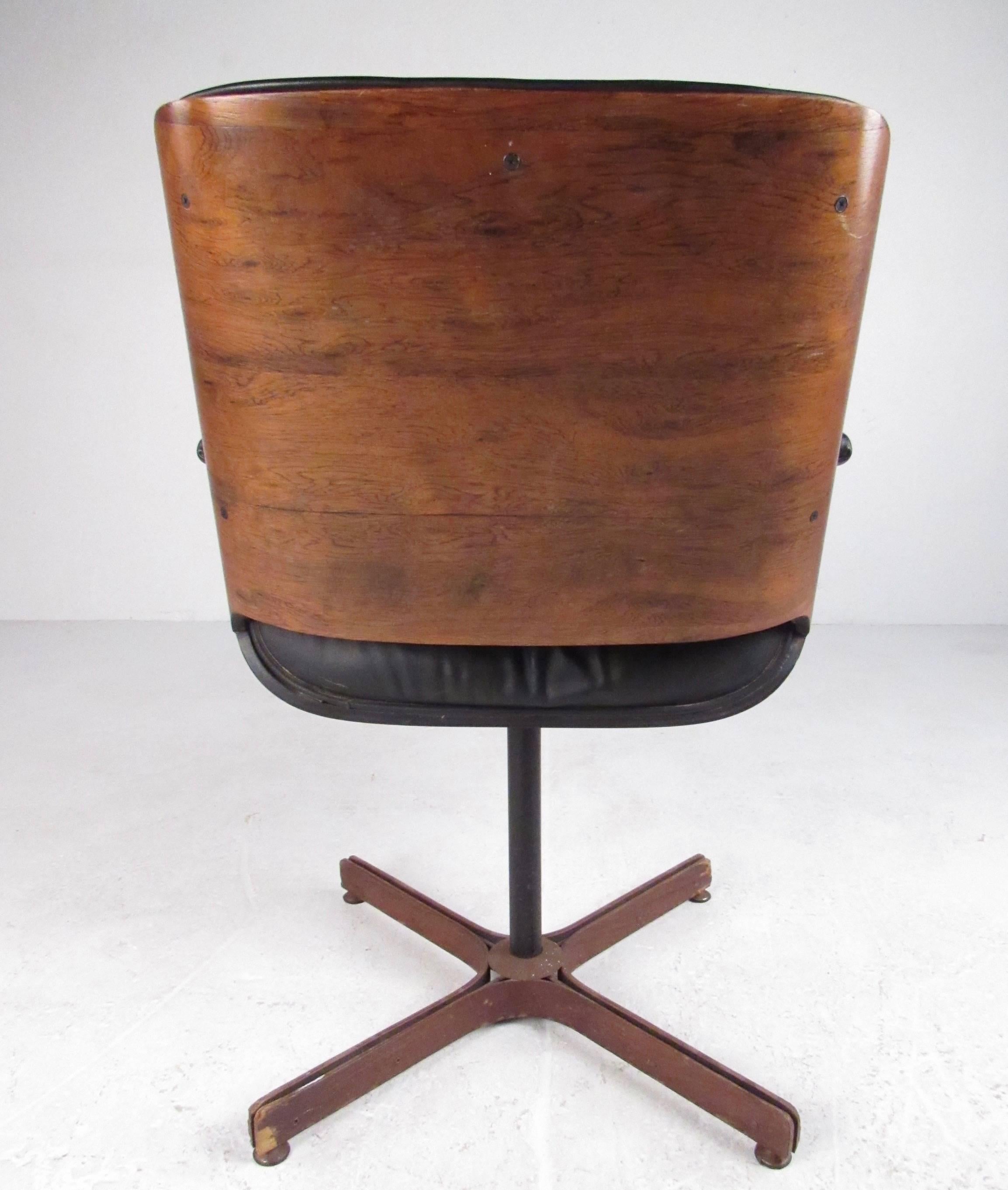 mid century swivel chair leather