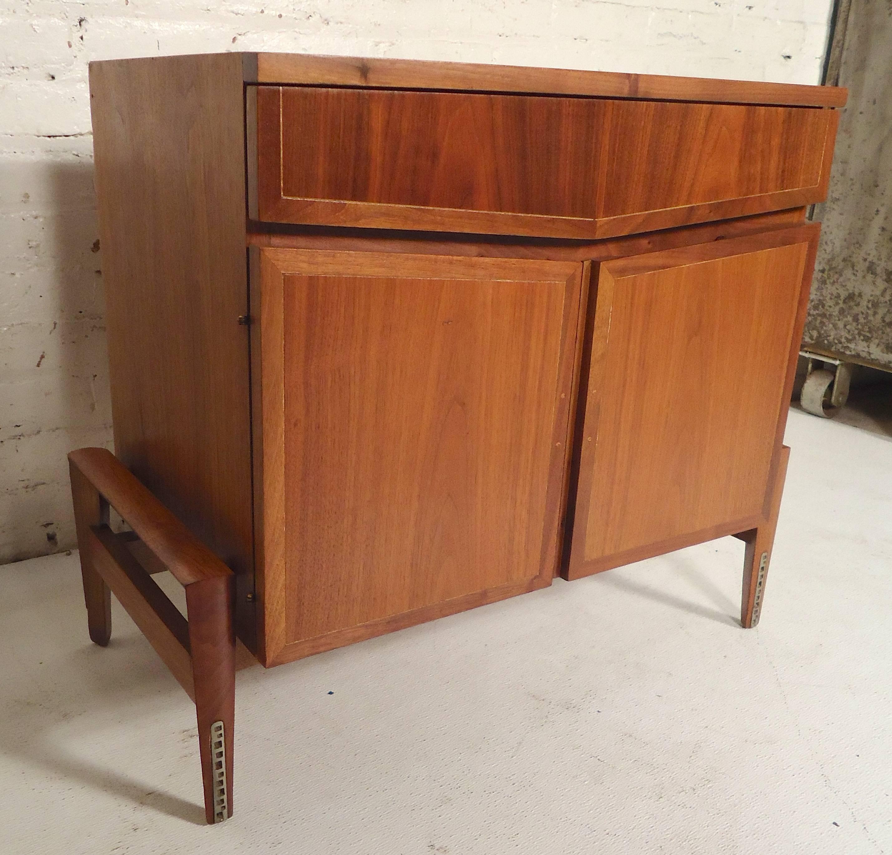 Unusual vintage cabinet with drawer and cabinet storage. Inlaid trim around the front. 

(Please confirm item location - NY or NJ - with dealer).
 