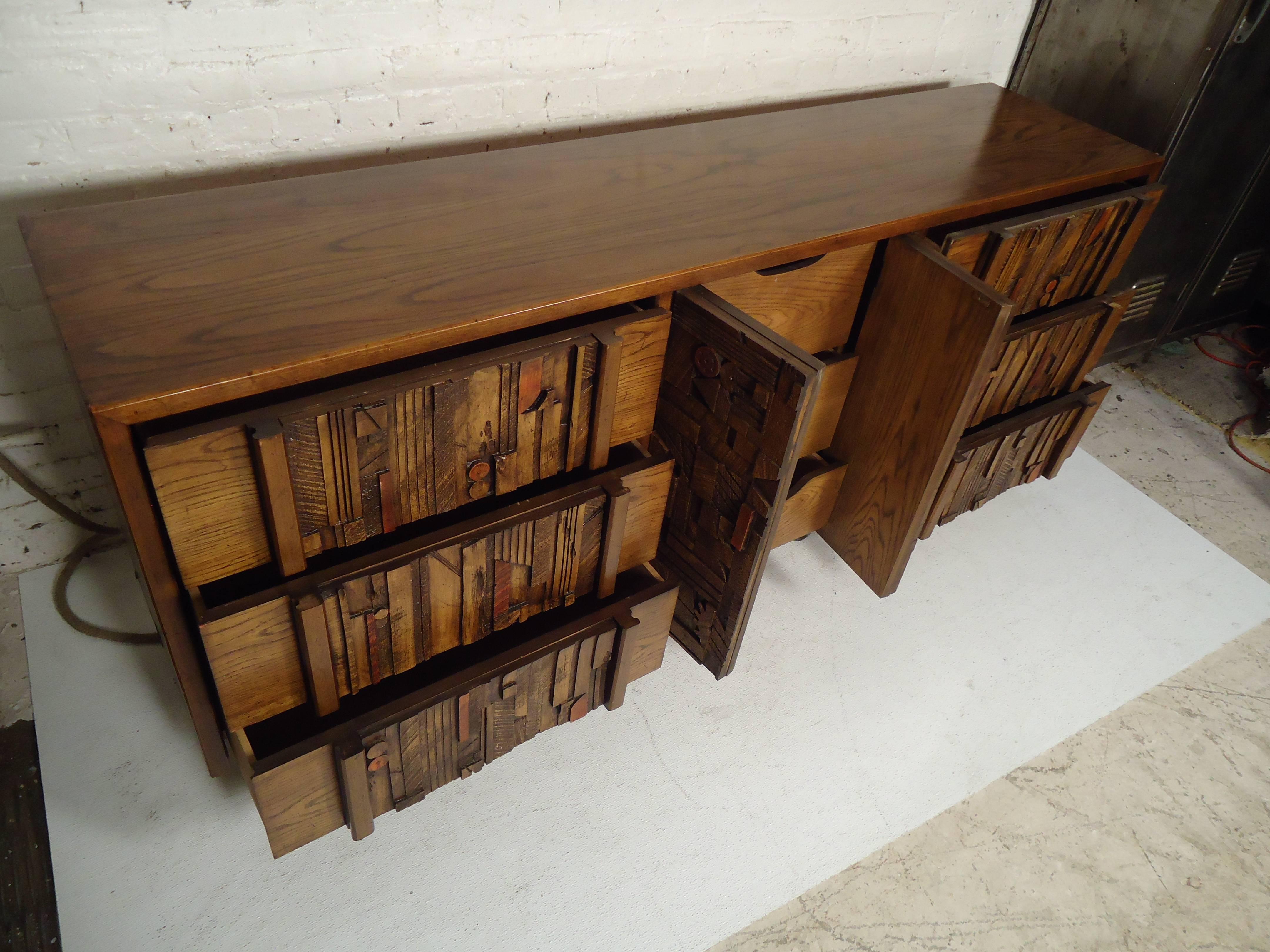 Long nine-drawer dresser by Lane for their Brutalist series. Attractive mosaic design on the drawers and doors.

(Please confirm item location, NY or NJ, with dealer).
 