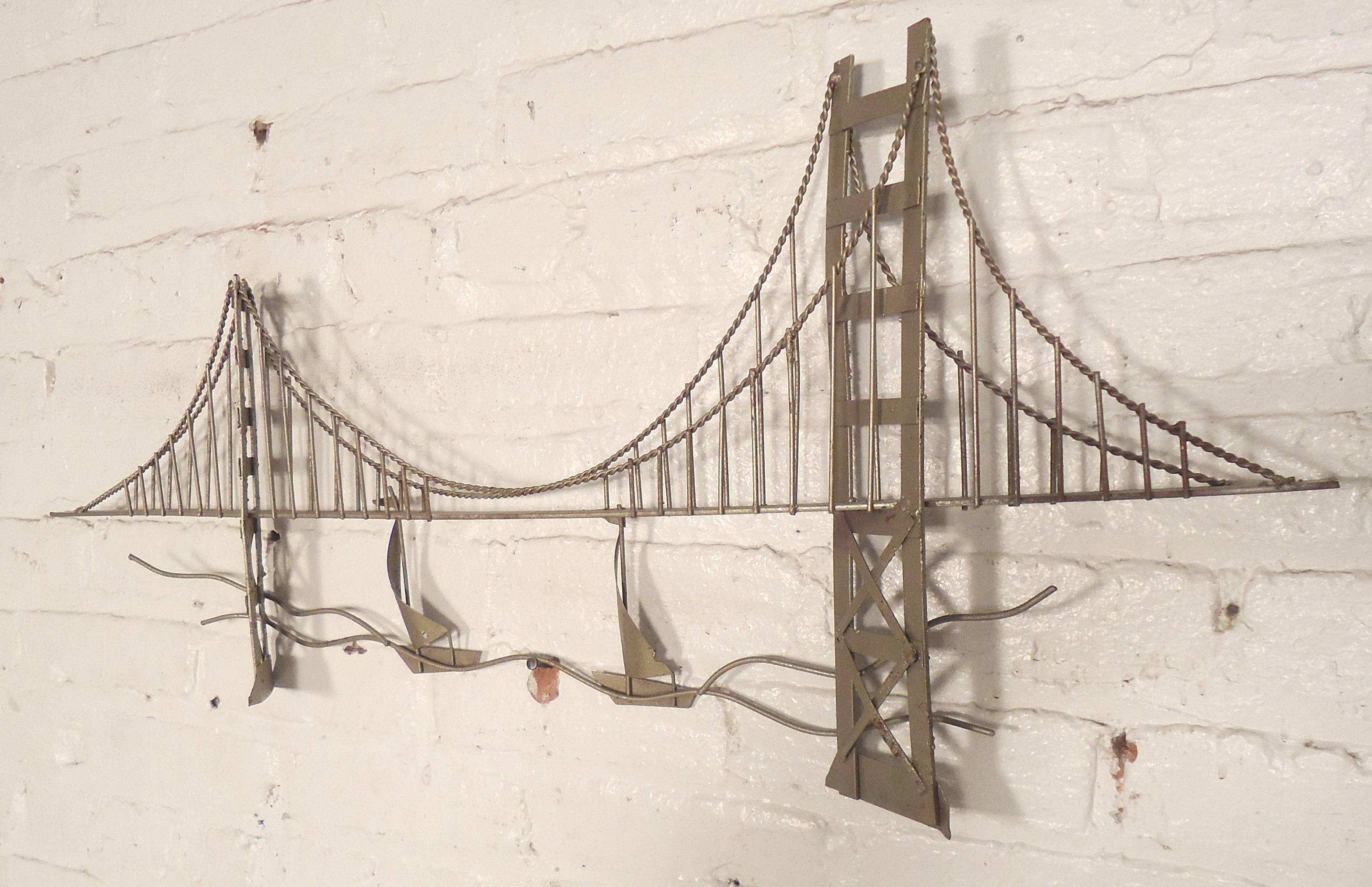 Metal bridge sculpture in brass coloring with boats and water. Designed after the Bay Bridge in San Fransisco and in the style of Curtis Jere.

(Please confirm item location - NY or NJ - with dealer).
    