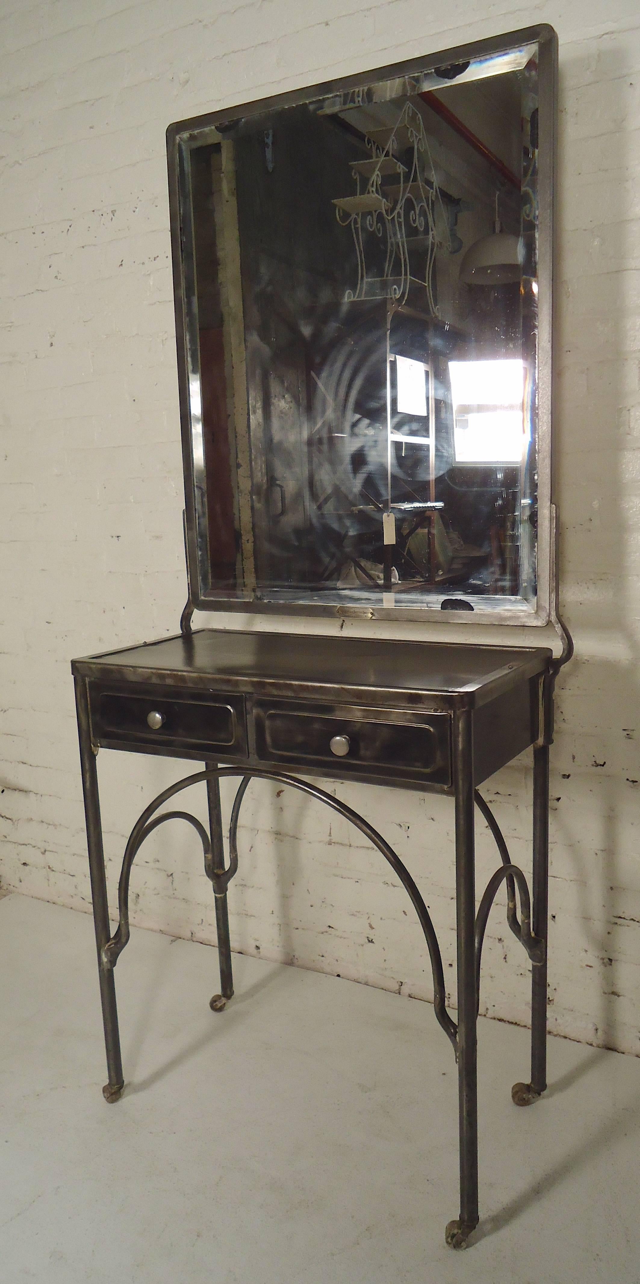 Vintage metal vanity restored in a bare metal style finish. Large mirror on desk with drawers set on casters.

(Please confirm item location, NY or NJ, with dealer).
 