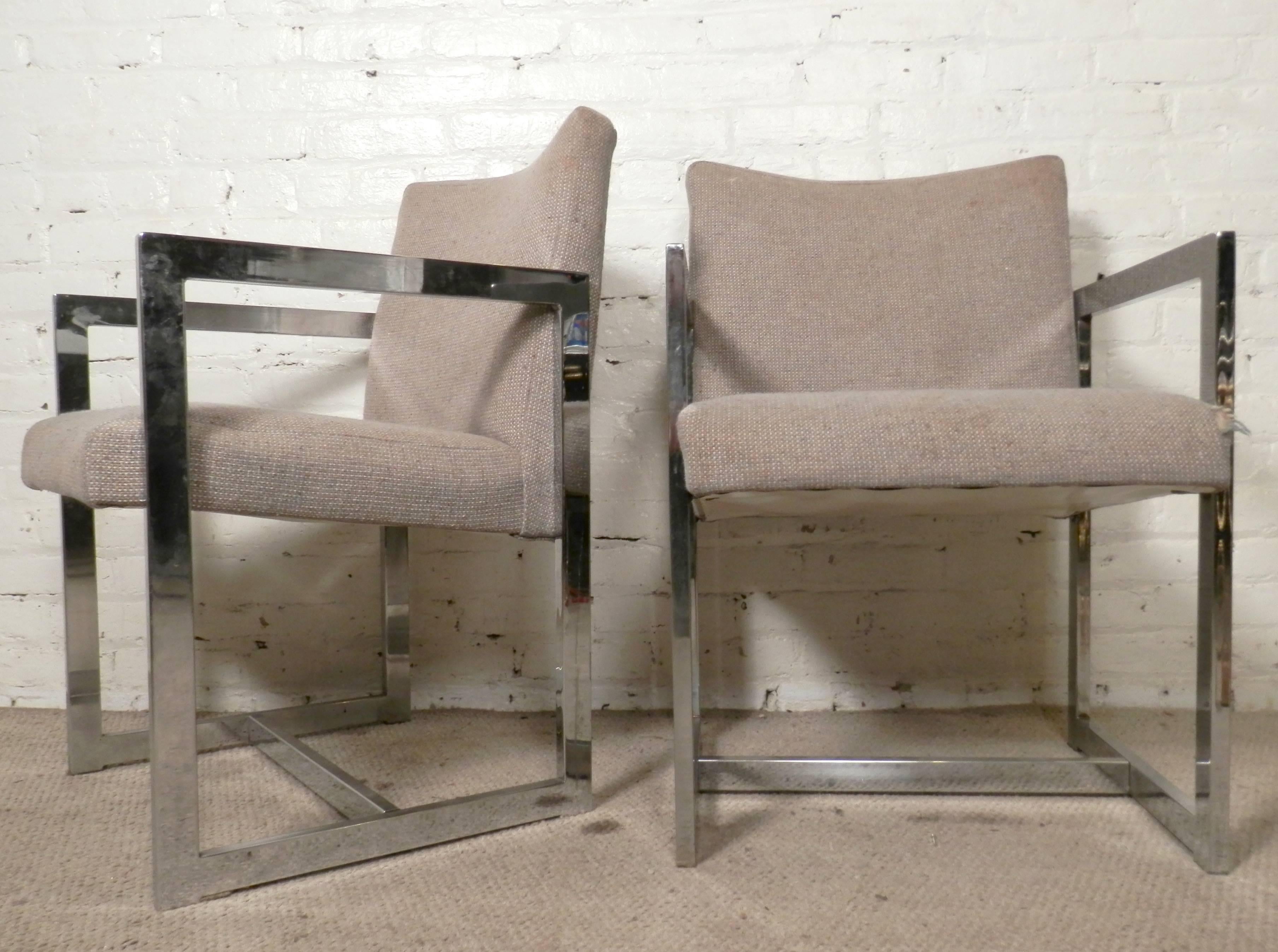 Sleek Mid-Century Modern polished chrome chairs. Milo Baughman style side chairs with straight angular lines and cushioned seat and back.

(Please confirm item location - NY or NJ - with dealer).
  