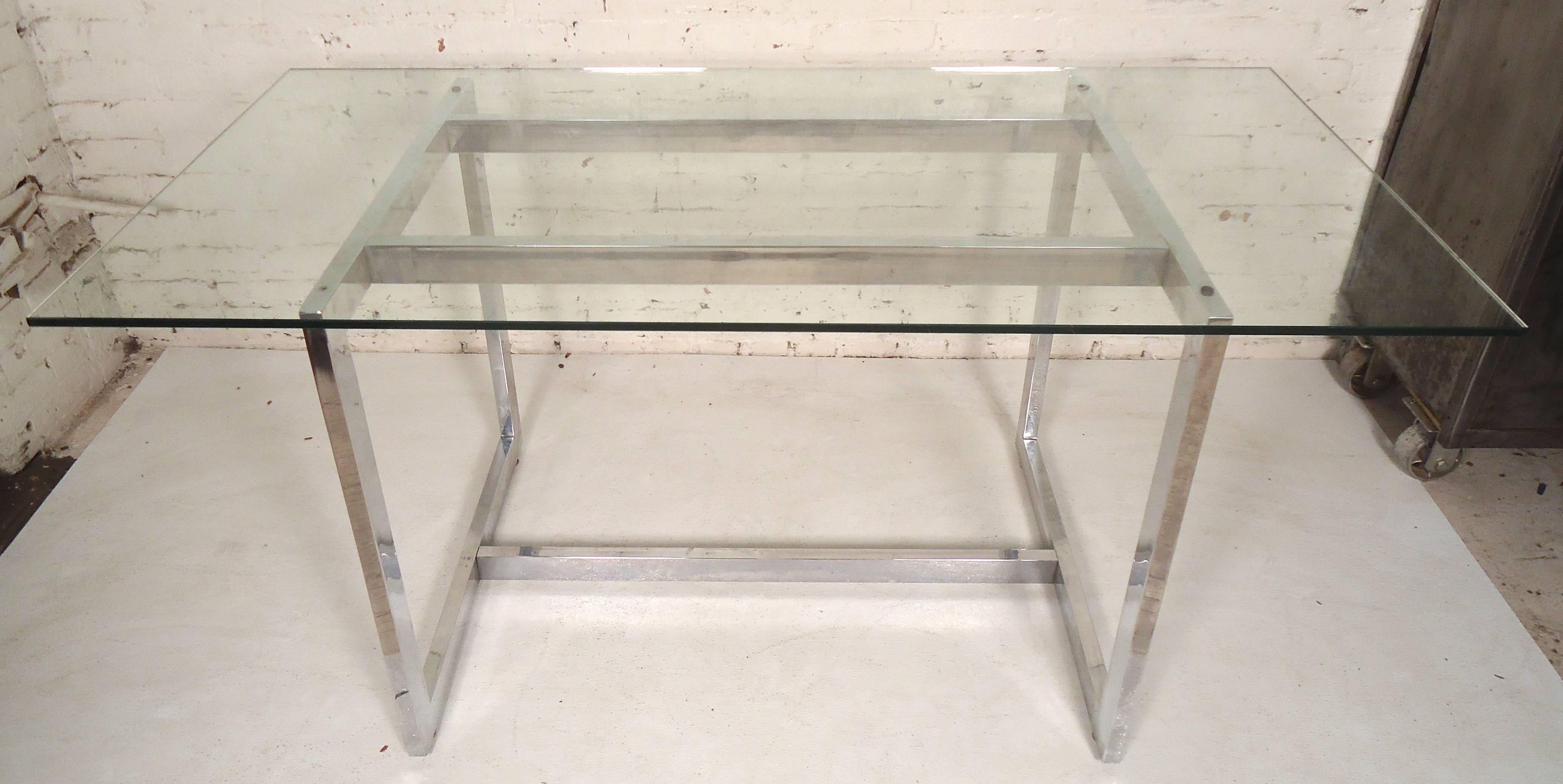 Vintage Milo Baughman inspired dining table with thick glass top set on a polished chrome base. 

(Please confirm item location - NY or NJ - with dealer).
 