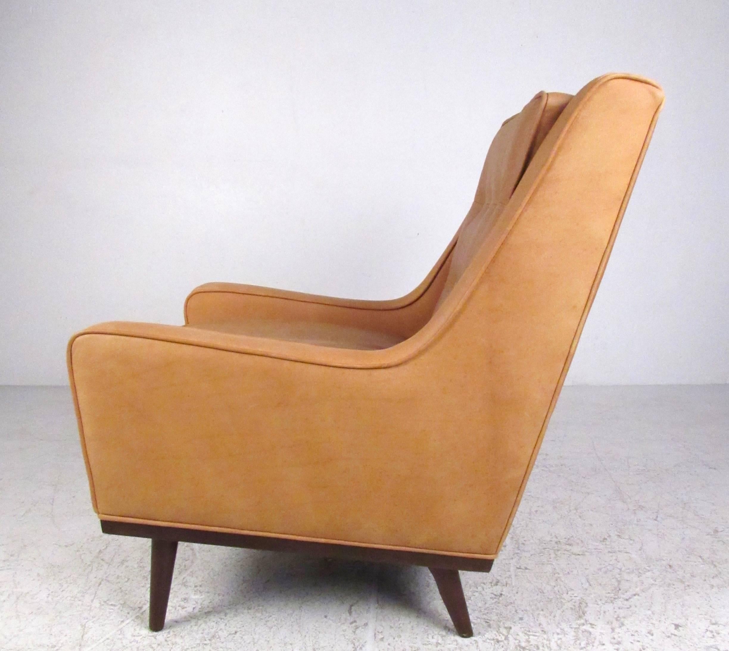 tufted leather arm chair