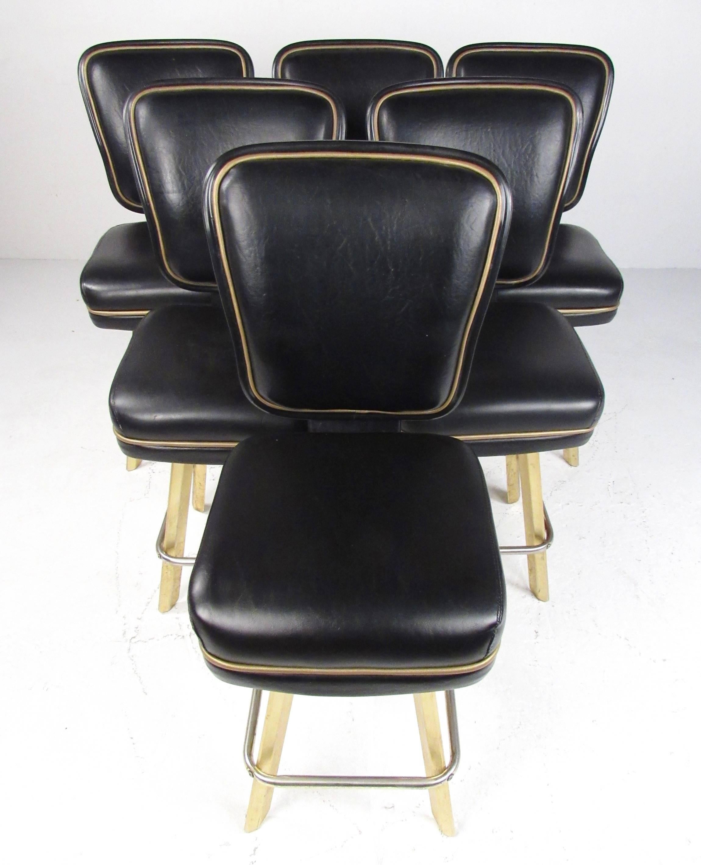 This set of six casino stools feature sturdy gold finish aluminum base, memory swivel seats, and Trump Plaza stitching on the back. With slot machine seat height of 24 inches, this matching set of six makes a unique addition to home or business.