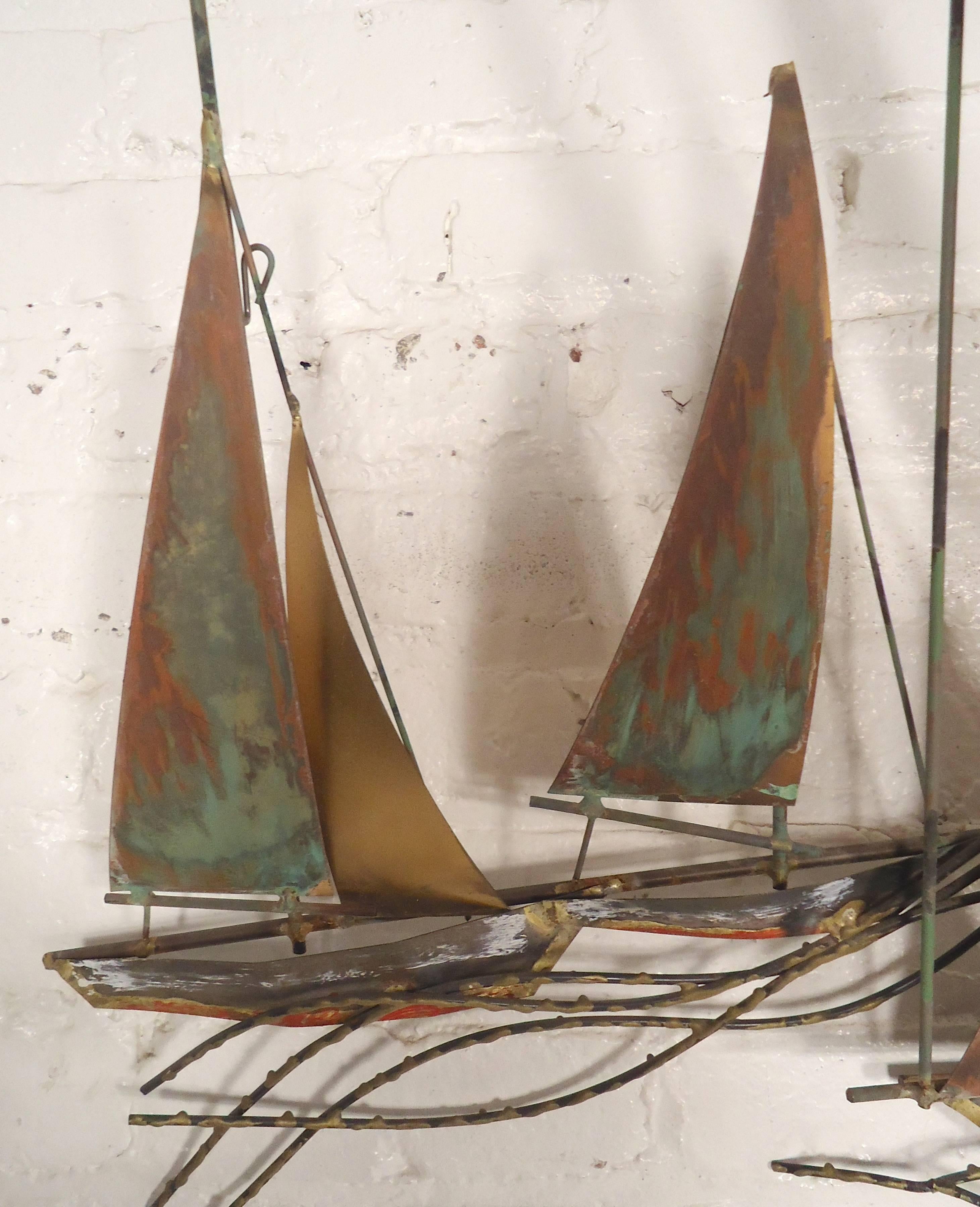 Large metal wall art designed by C. Jere. Combining brass metal and paint, creating a three dimensional scene of boats on the water.

(Please confirm item location - NY or NJ - with dealer).
   