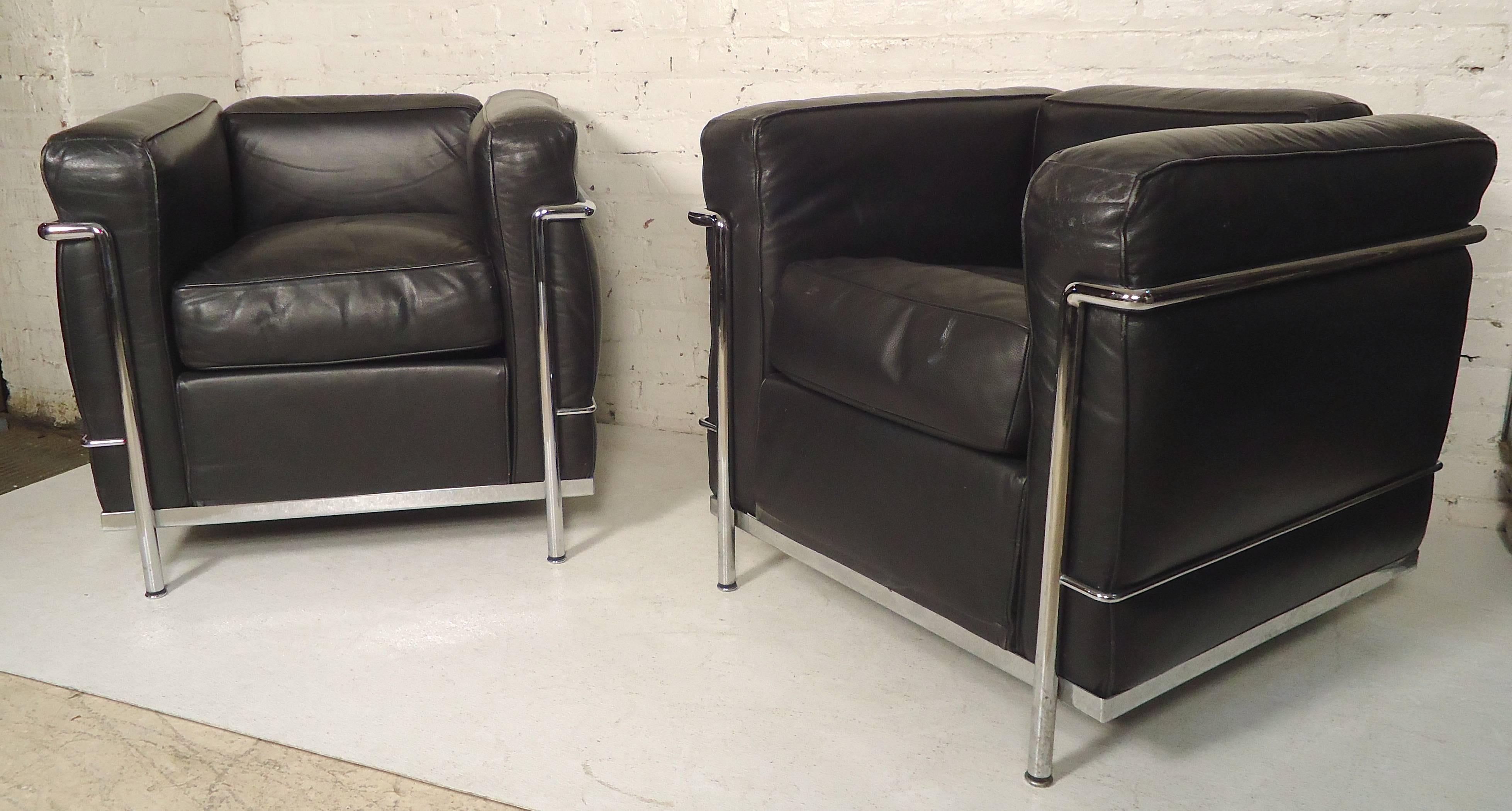 Pair of Mid-Century Modern chrome framed leather cube chairs by Cassina. Classic style that moves perfectly into a modern home or office.

(Please confirm item location - NY or NJ - with dealer).


 