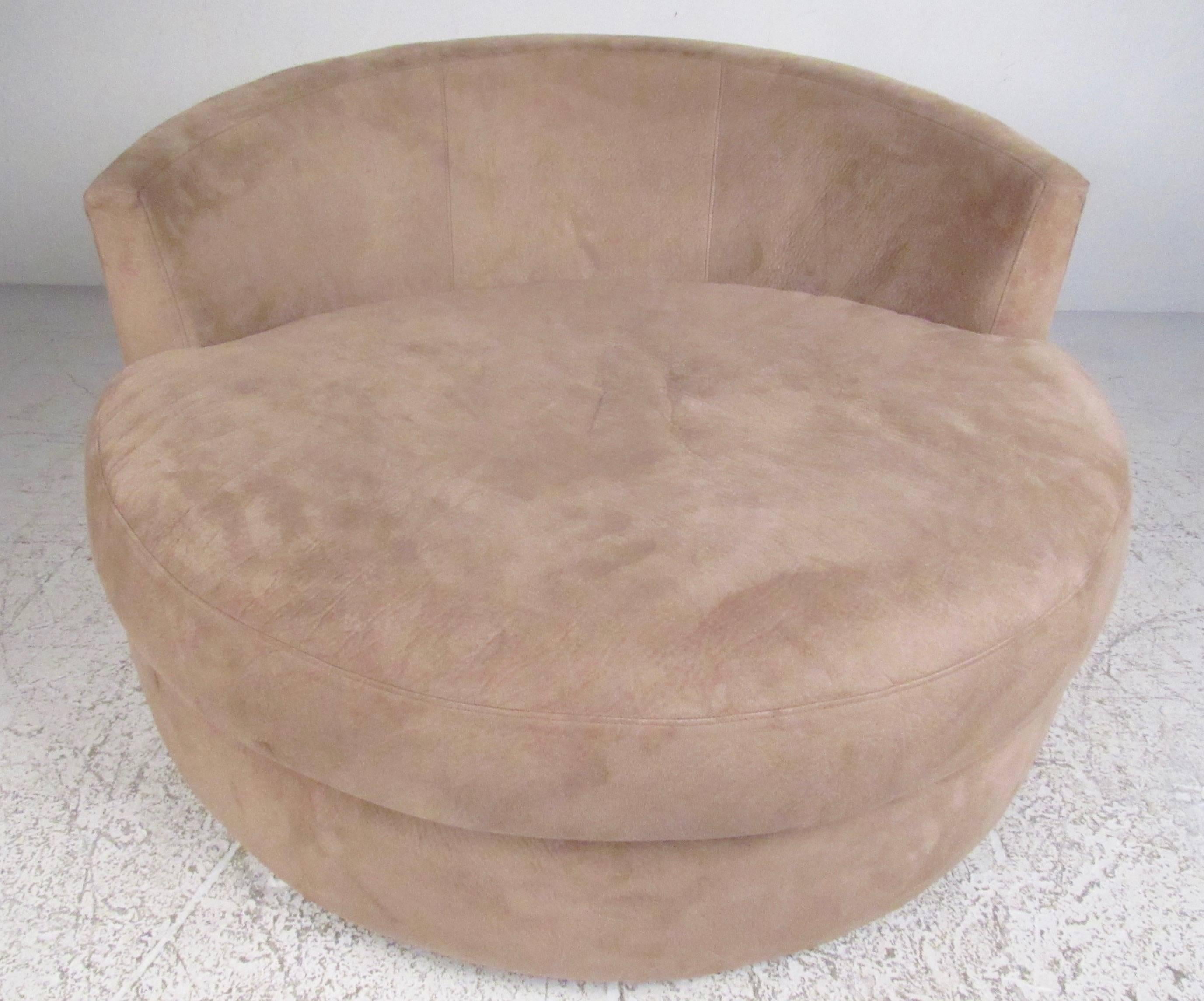 This unique disc style lounge chair after Adrian Pearsall features contemporary modern style, suede-like upholstery, and stylish design. Please confirm item location (NY or NJ).