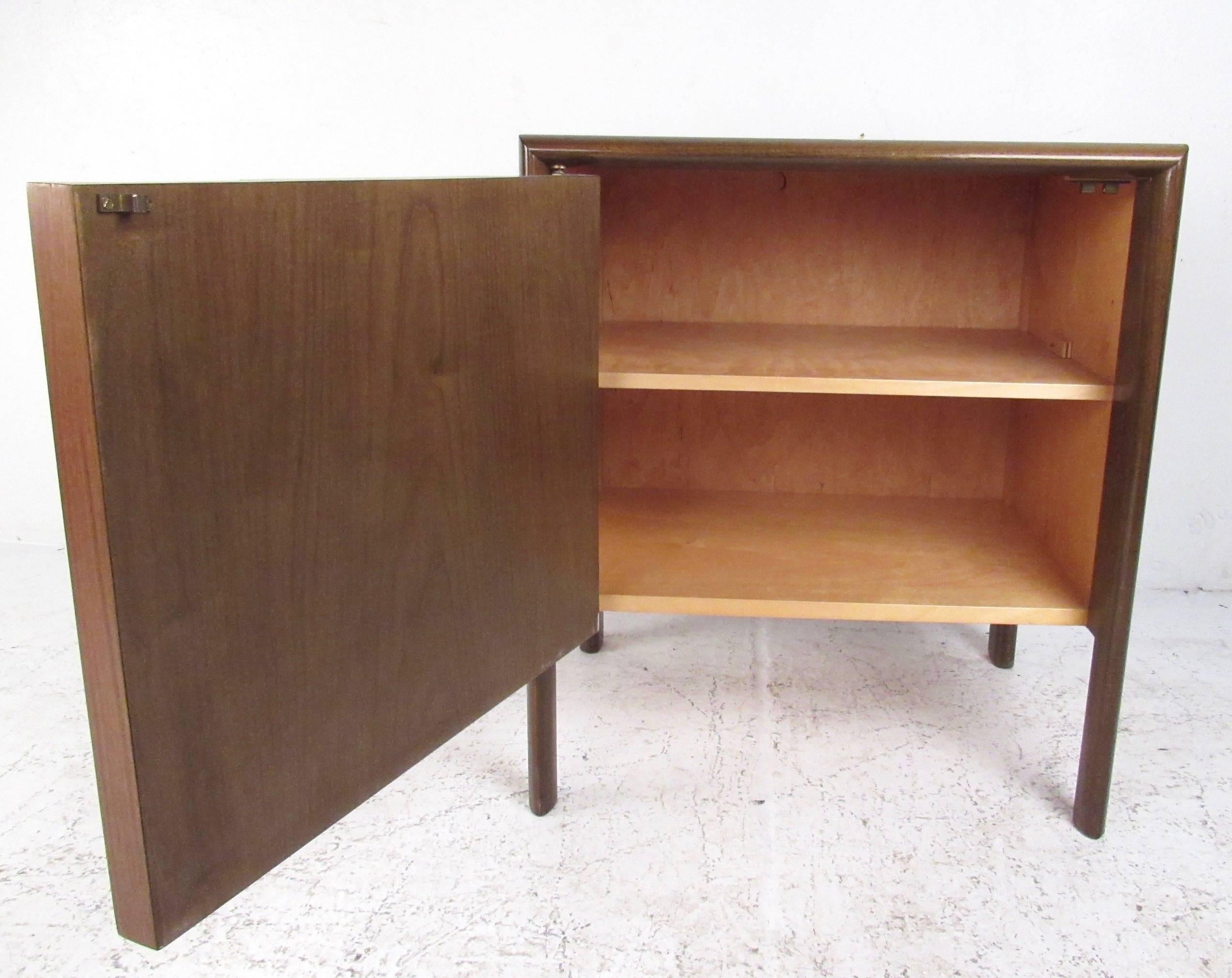 This stylish vintage modern nightstand features Scandinavian Modern design of Edmond Spence of Sweden. Cabinet door contains shelved storage, ideal for bedside or living room use. Please confirm item location (NY or NJ). 