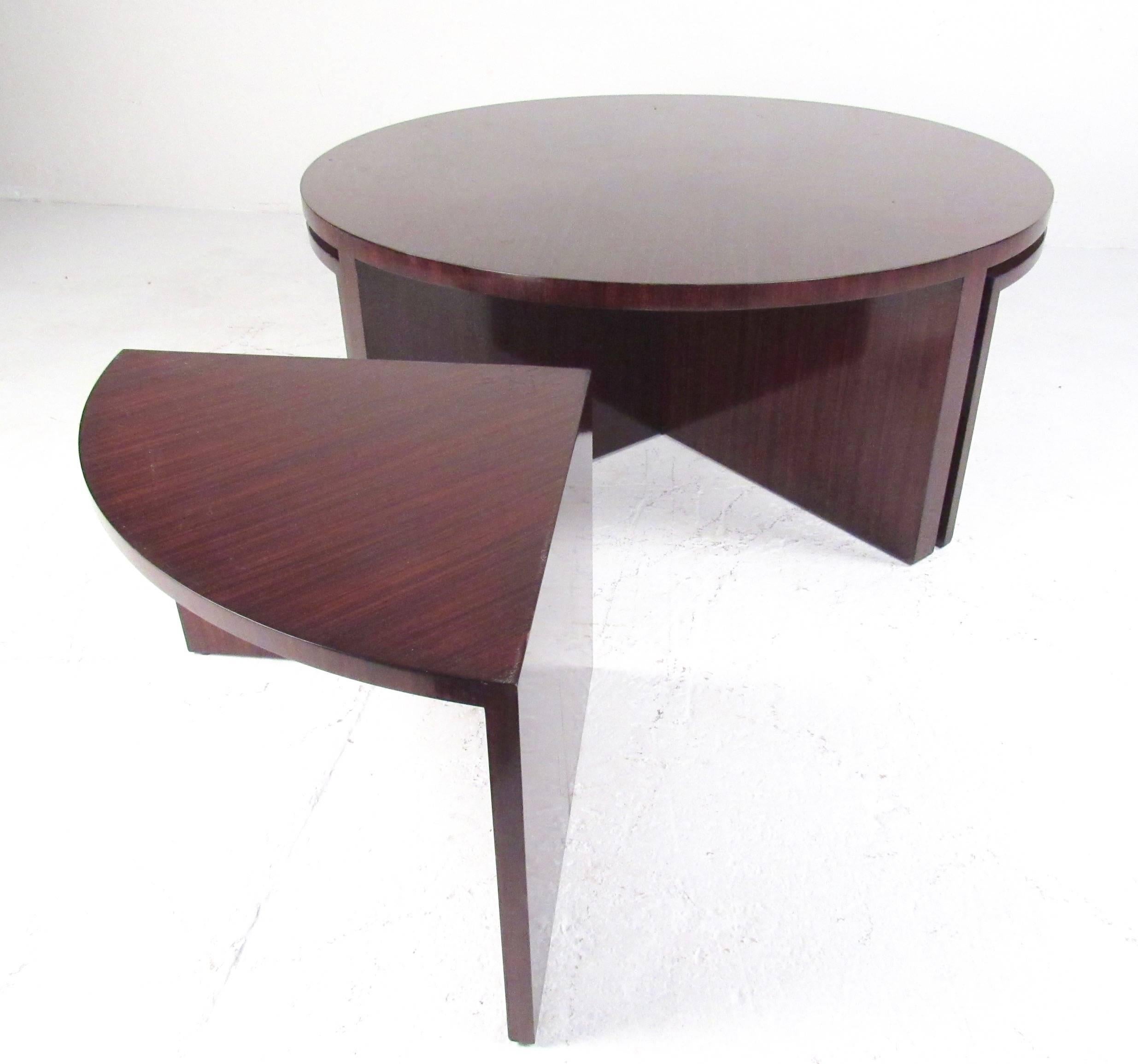 This stylish modern cocktail table comes complete with nesting bench stools. This Ralph Lauren 