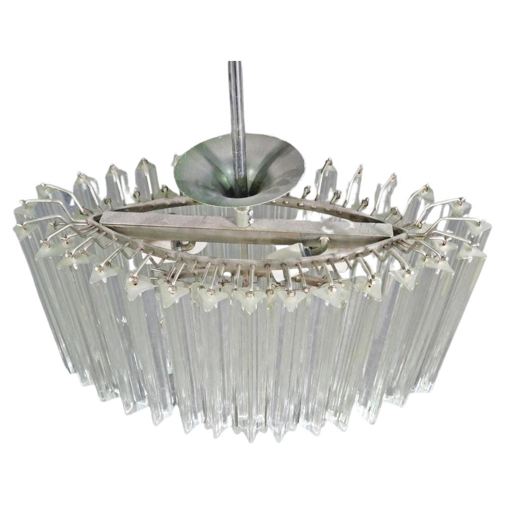 An impressive glass chandelier in the style of Camer. Sure to make a great focal point of any room, this vintage chandelier is truly unique. Please confirm item location with seller (NY/NJ).
