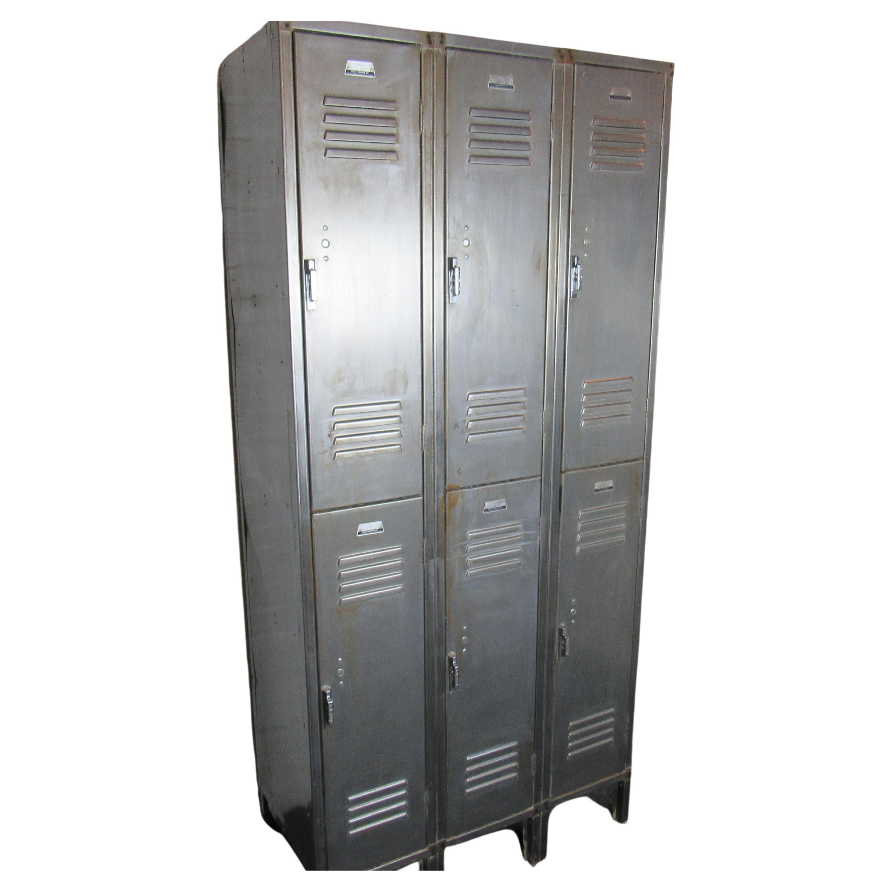 A vintage set of six lockers, this industrial metal cabinet is a unique way to add storage and organization to a space. Please confirm item location with seller (NY/NJ).