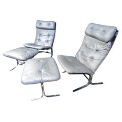 Pair of 'Siesta' Chairs with Ottomans