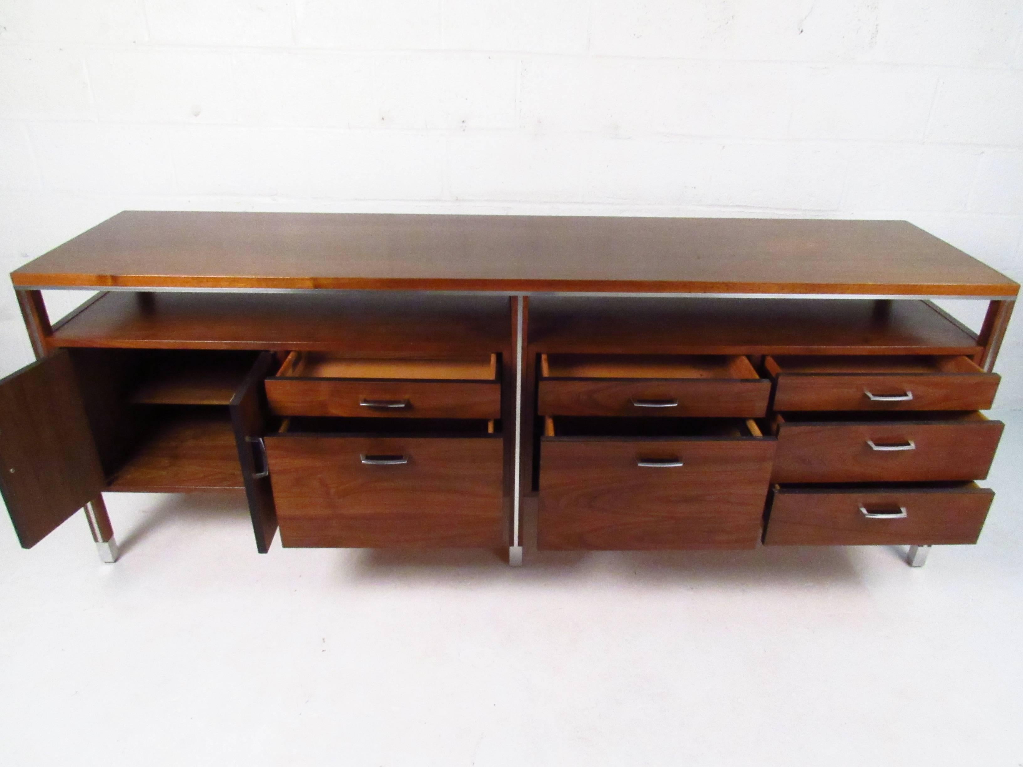 With ample options for storage and truly unique design, this mid-century office credenza by Directional combines style and efficiency. Wonderful variety of drawers and cabinets for organization, finished back, and unique aluminum trim add to the