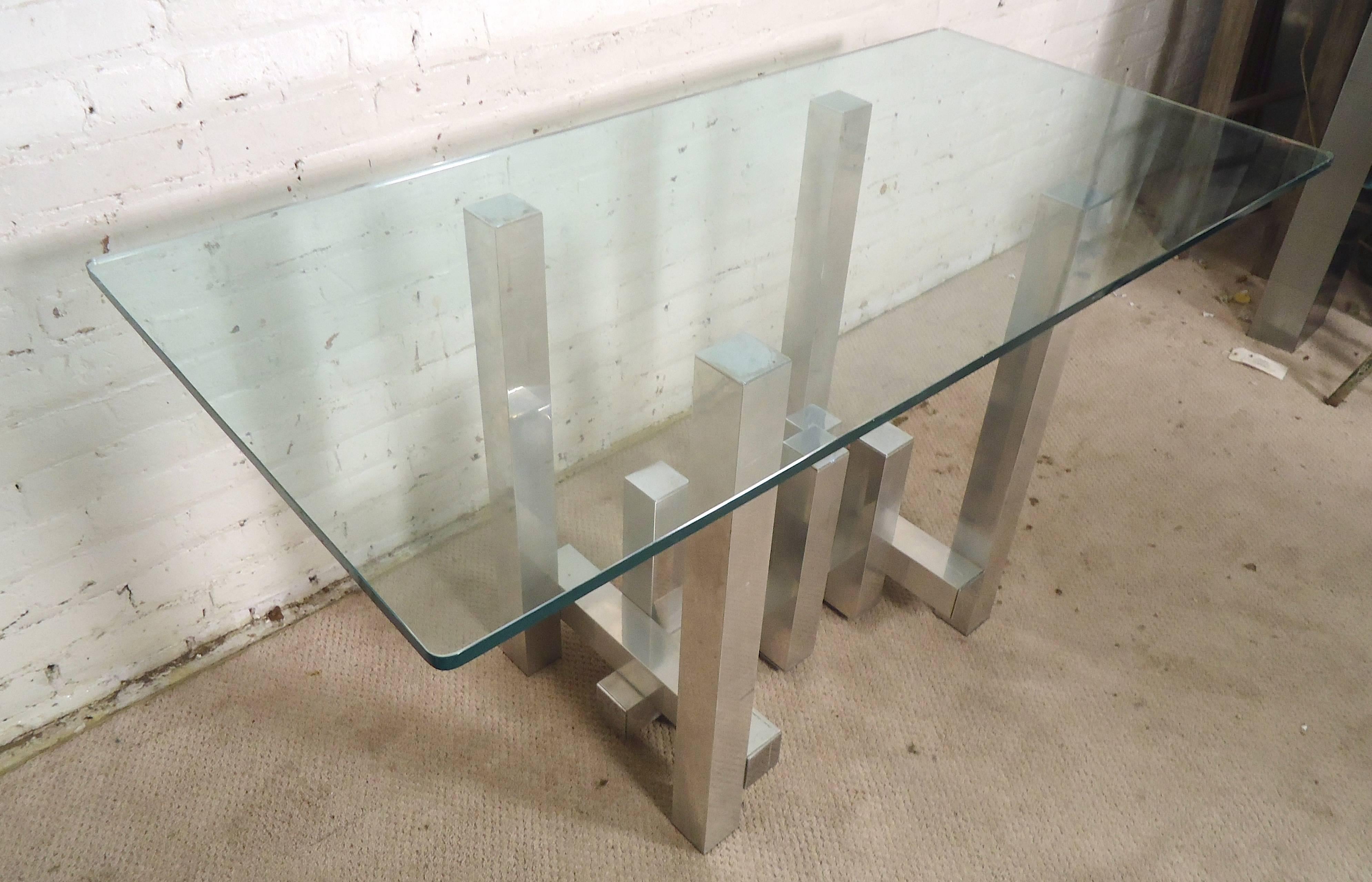 Fantastic chrome base table with glass top in the style of Paul Evans 