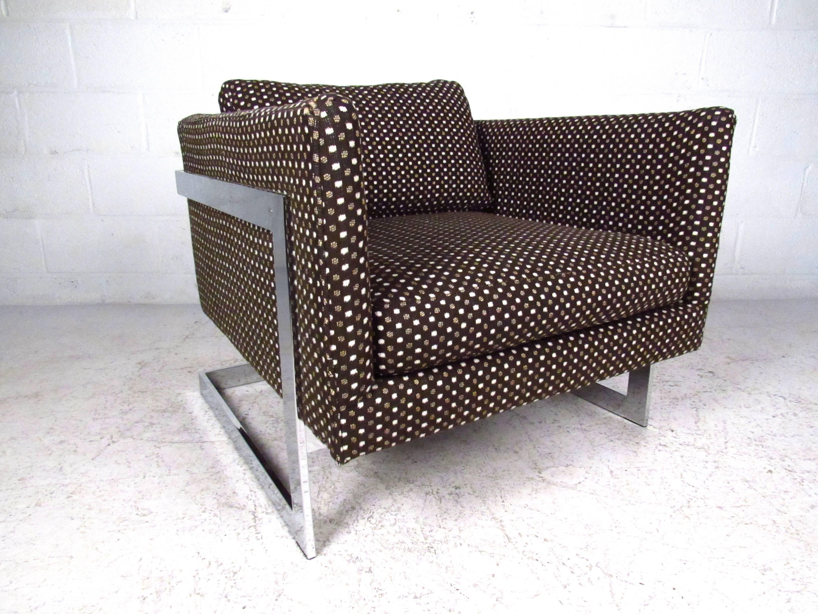 This beautiful matching set features a sturdy chrome frame and lovely vintage fabric. Comfortable lounge seat with ottoman at the perfect height, this Mid-Century Modern pair still has it's original manufacturer's label. Please confirm item location