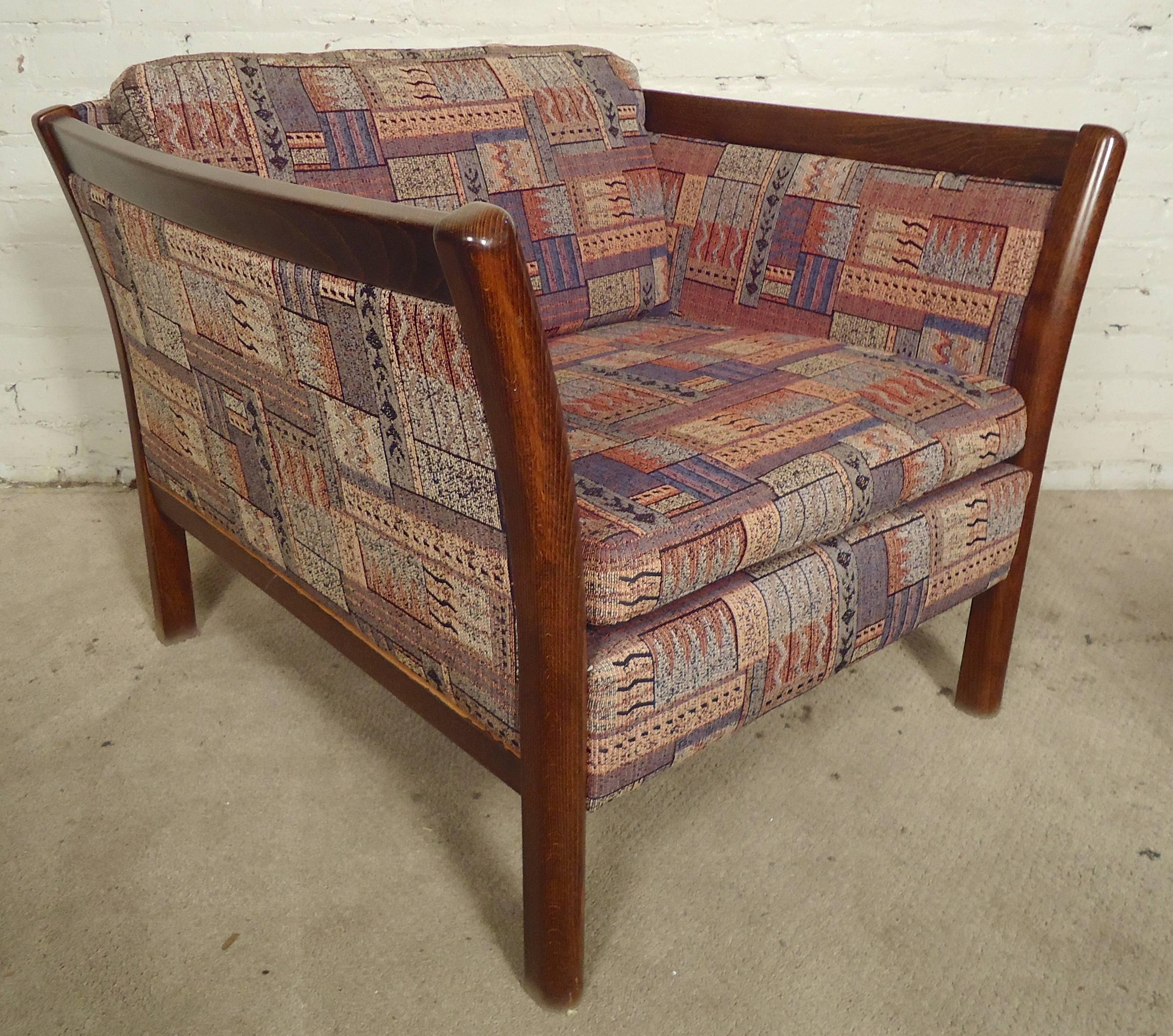 Mid-century modern arm chairs with wood trim and bowed arms. Very comfortable club chairs with vintage upholstery.

(Please confirm item location - NY or NJ - with dealer)
