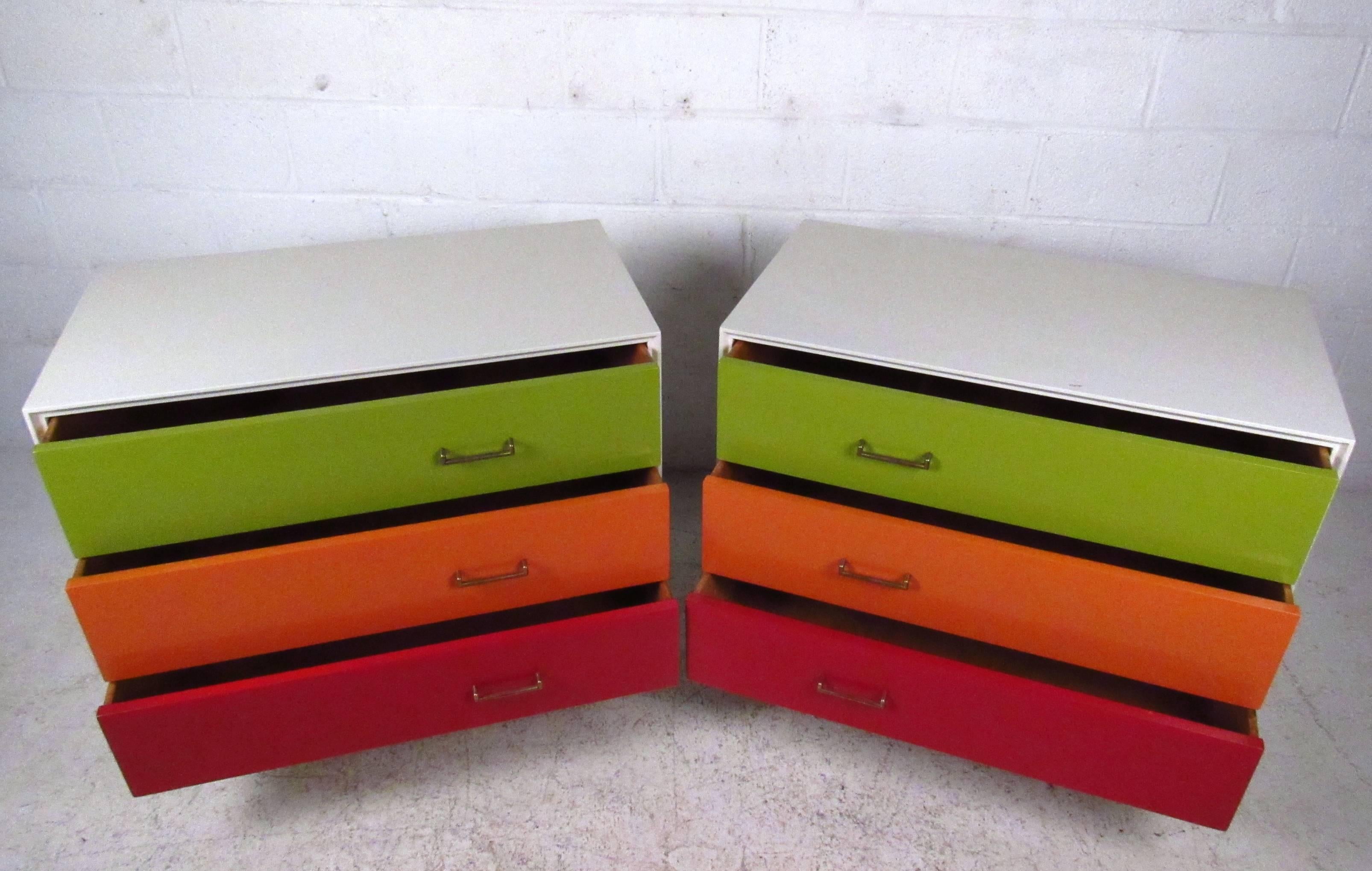 This unique pair of vintage multicolor bachelor's chests make the perfect addition to any room. A wonderful splash of color for a children's room or nursery, or for use as a funky storage solution in any setting. Manufactured by Furnette, this