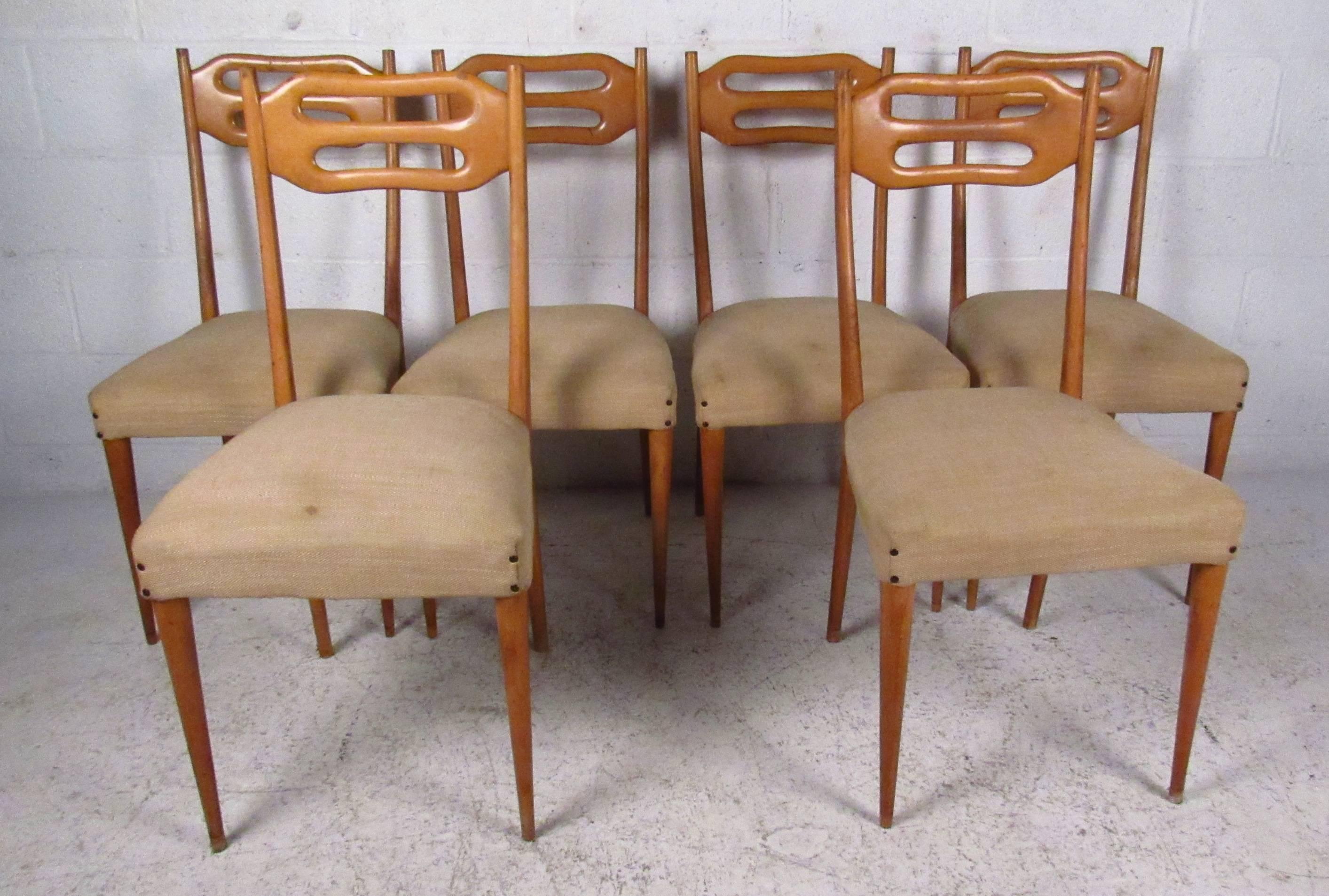 Set of six stylish high back dining chairs with maple frames and upholstered seats. Please confirm item location (NY or NJ) with dealer.