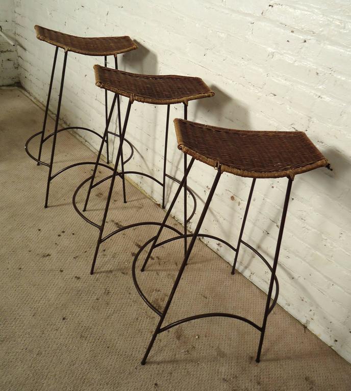 Three MidCentury Iron and WIcker Stools at 1stdibs
