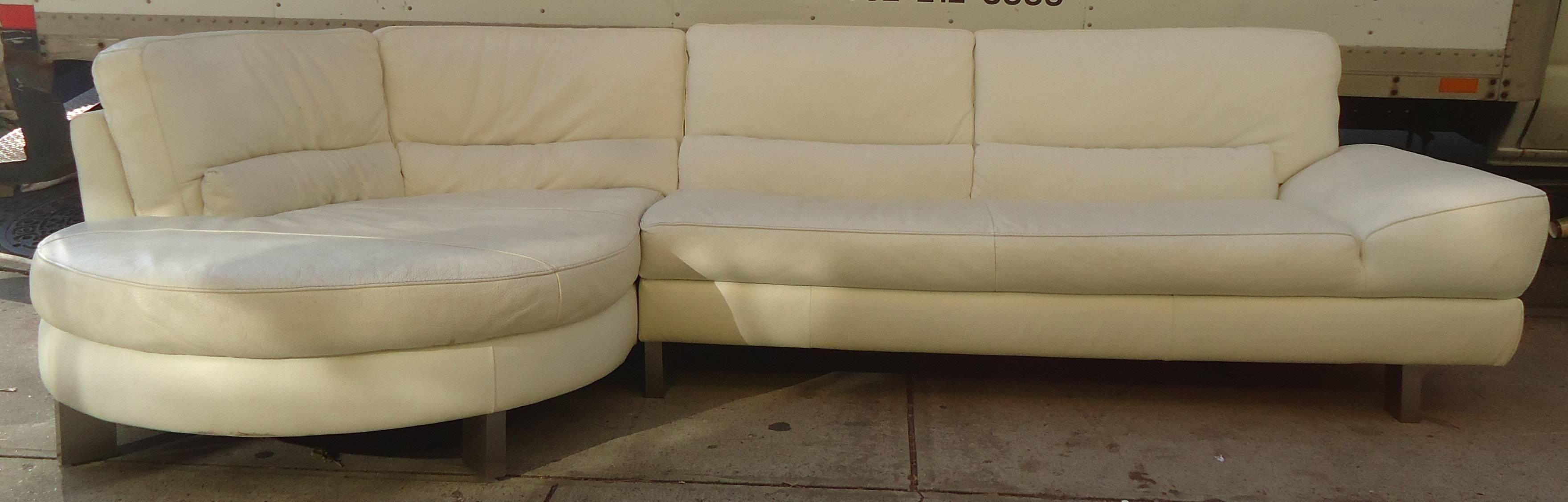 Vintage-modern sectional sofa features leather upholstery and chrome feet. Italsofa by Natuzzi. This distinctive modern sectional sofa adds to the stylish Italian design of the piece. 

Please confirm item location NY or NJ with dealer.