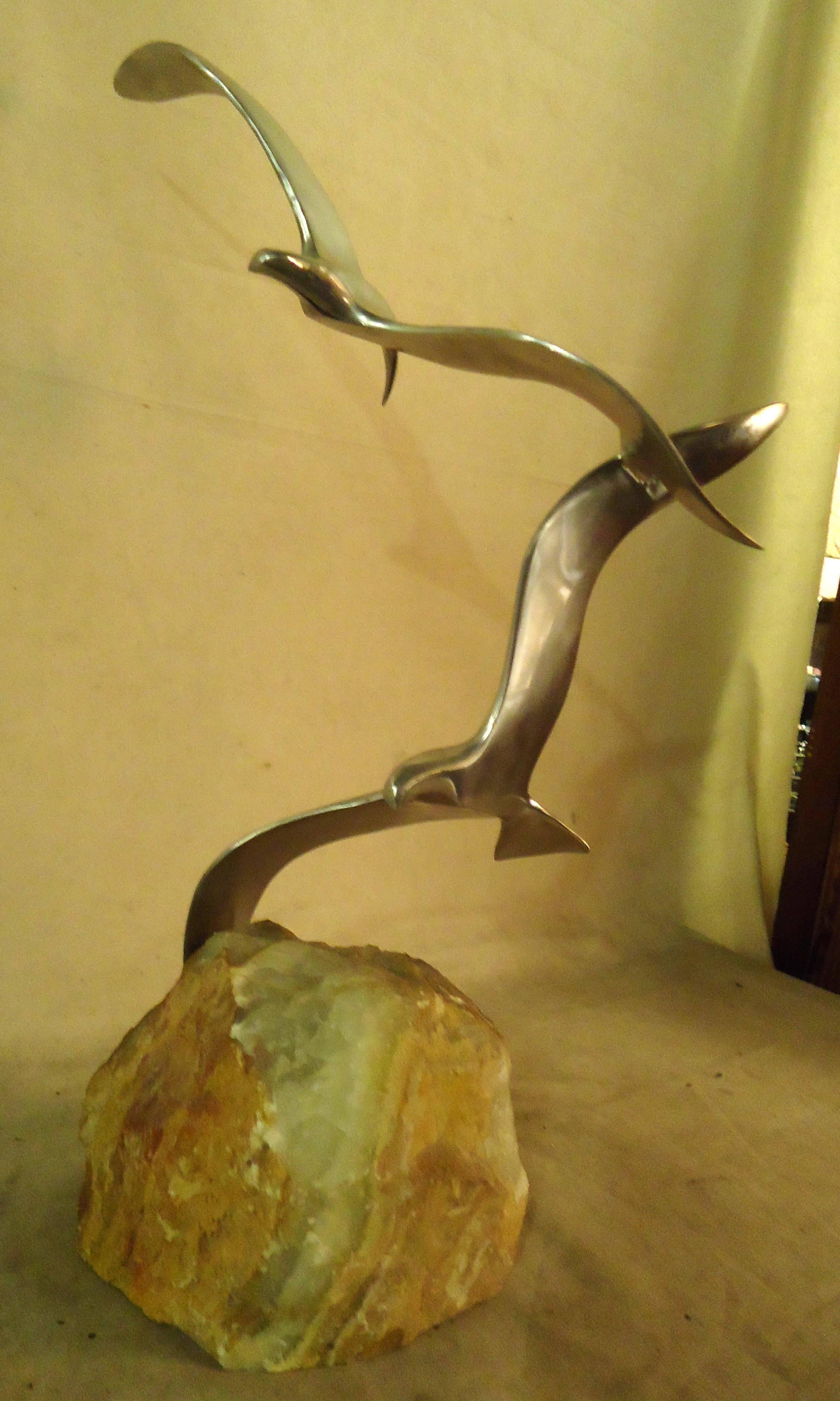 Vintage-modern sculpture, two metal birds mounted onto stone. Signed and dated C-Jere.