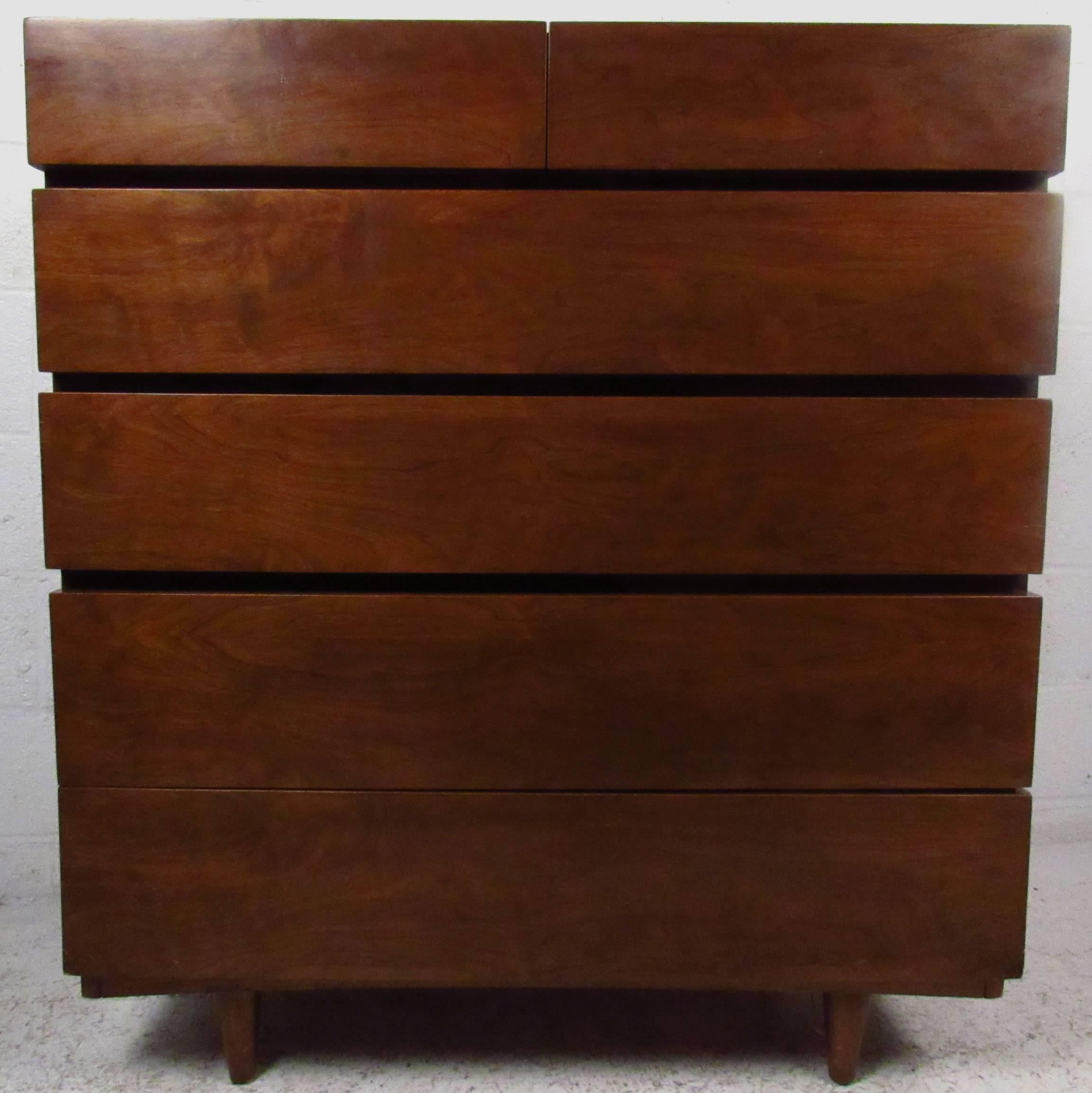 Vintage-modern highboy dresser by American of Martinsvile featuring six drawers with beautiful walnut grain throughout.

Please confirm item location NY or NJ with dealer.