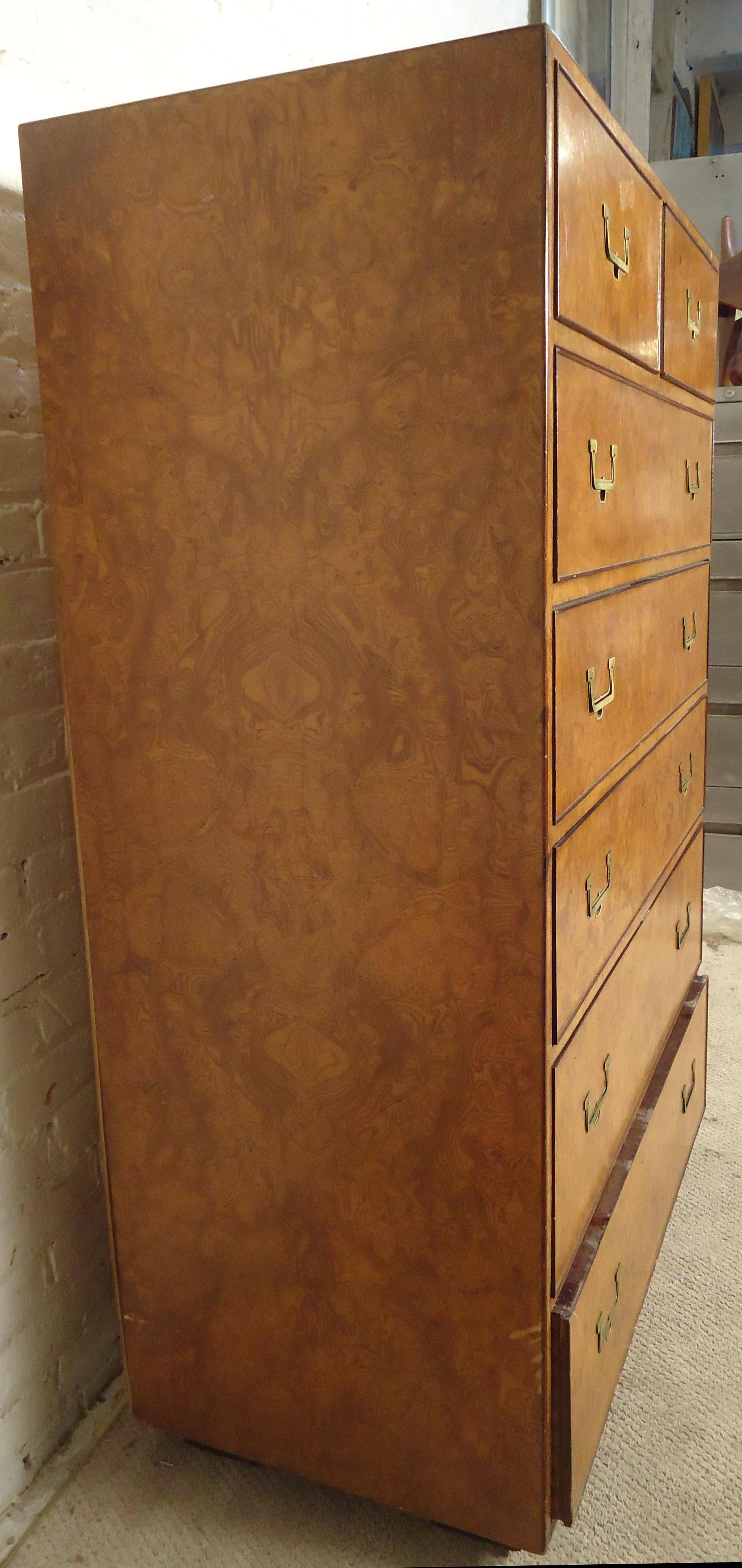 Vintage-modern tall dresser featuring seven drawers with sculpted brass handles, beautiful burl wood grain throughout, manufactured by Widdicomb.

Please confirm item location NY or NJ with dealer.
