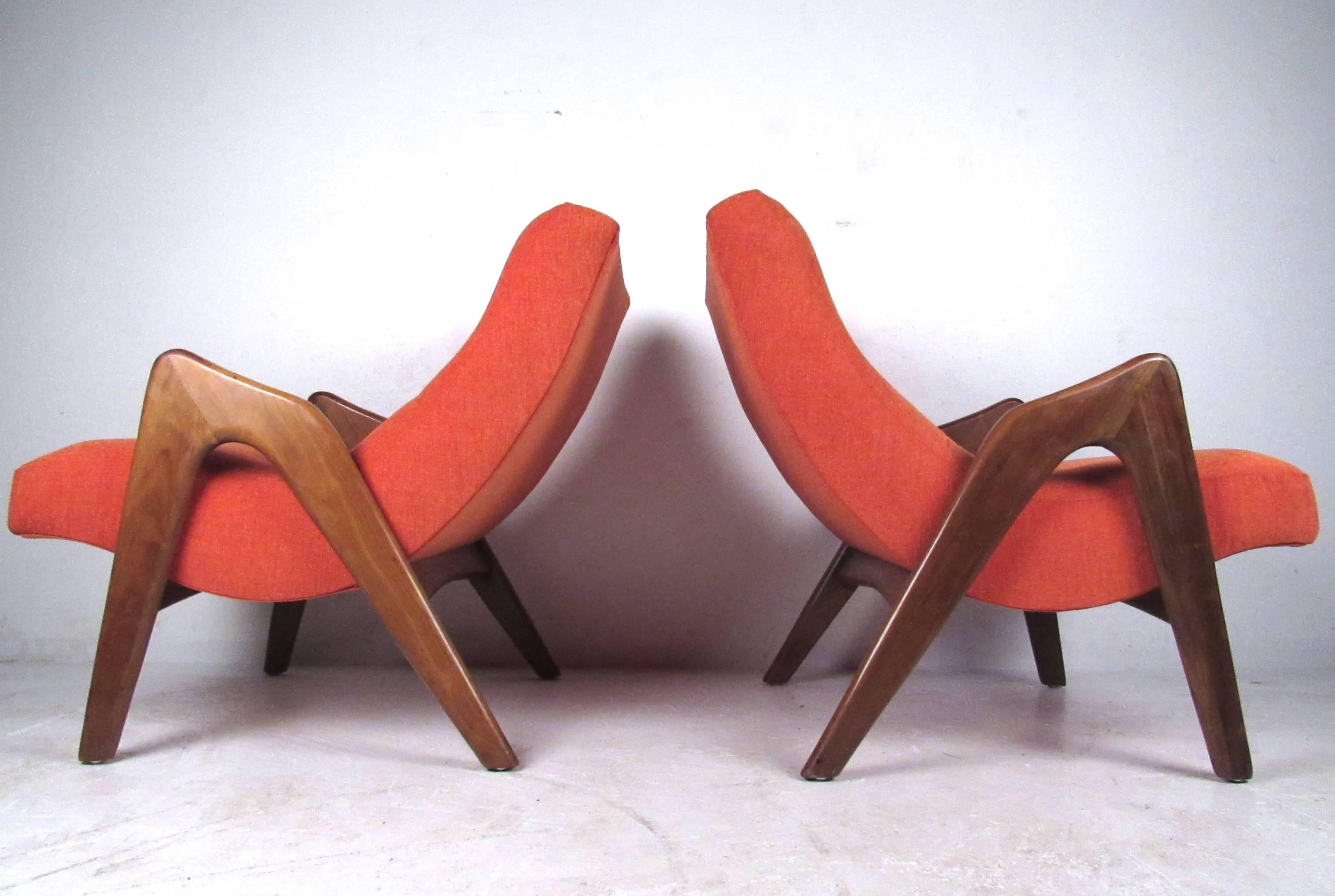 Beautiful pair of sculpted Mid-Century lounge chairs features the comfort and design Pearsall is so well-known for. Uniquely shaped tufted seat backs make these a comfortable and stylish addition to any interior. Please confirm item location (NY or