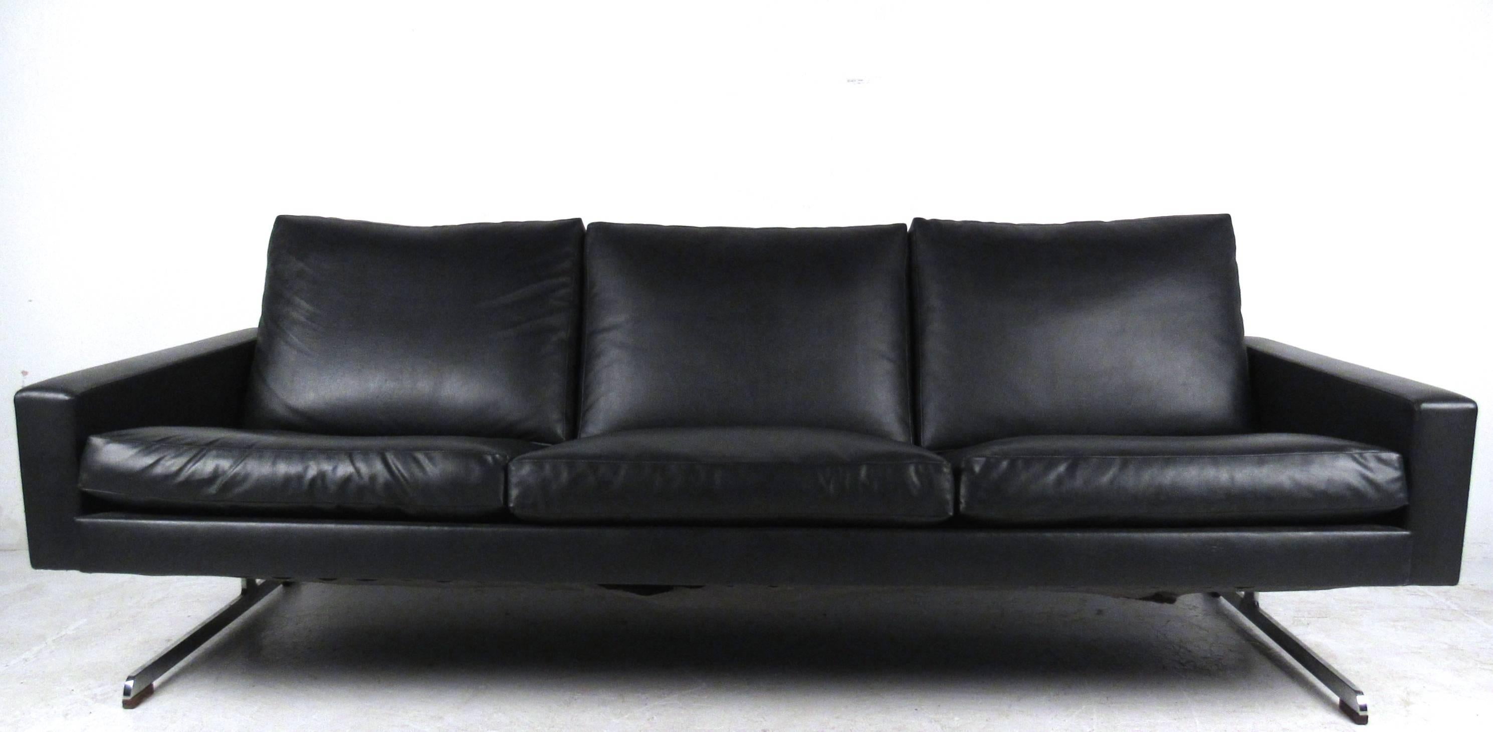 This comfortable and stylish sofa features a unique modern design, complete with sturdy chrome legs. Perfect addition to any seating arrangement, please confirm item location (NY or NJ). 