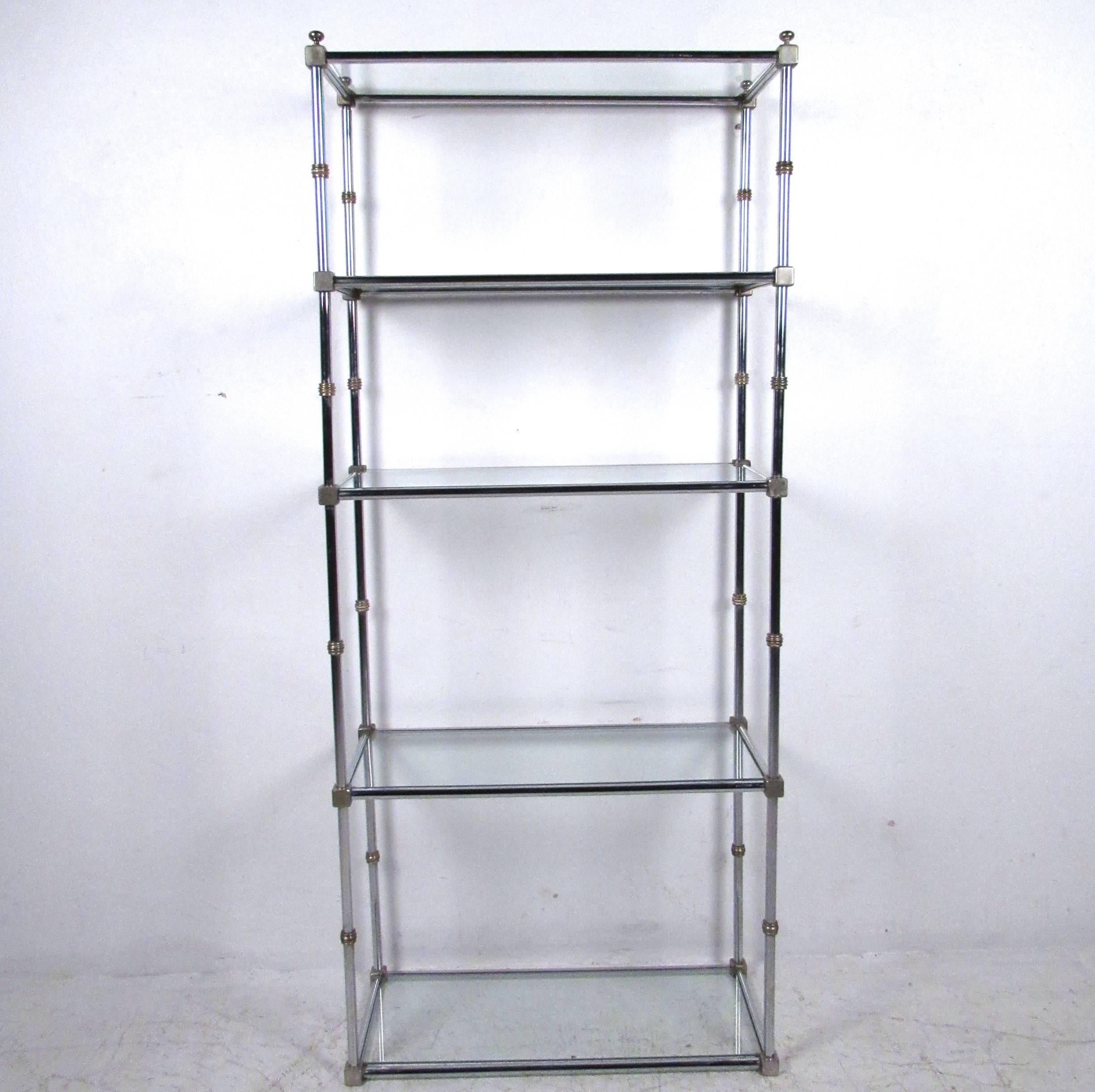 This five shelf vintage etagere features brass trim and makes a stylish display shelf for home or business. Please confirm item location (NY or NJ). 
