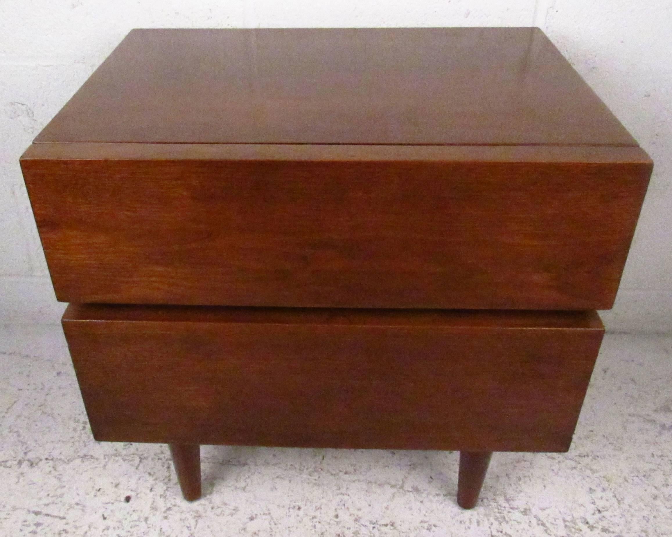 Vintage-modern nightstand, features two drawers and rich walnut grain throughout.

Please confirm item location NY or NJ with dealer.