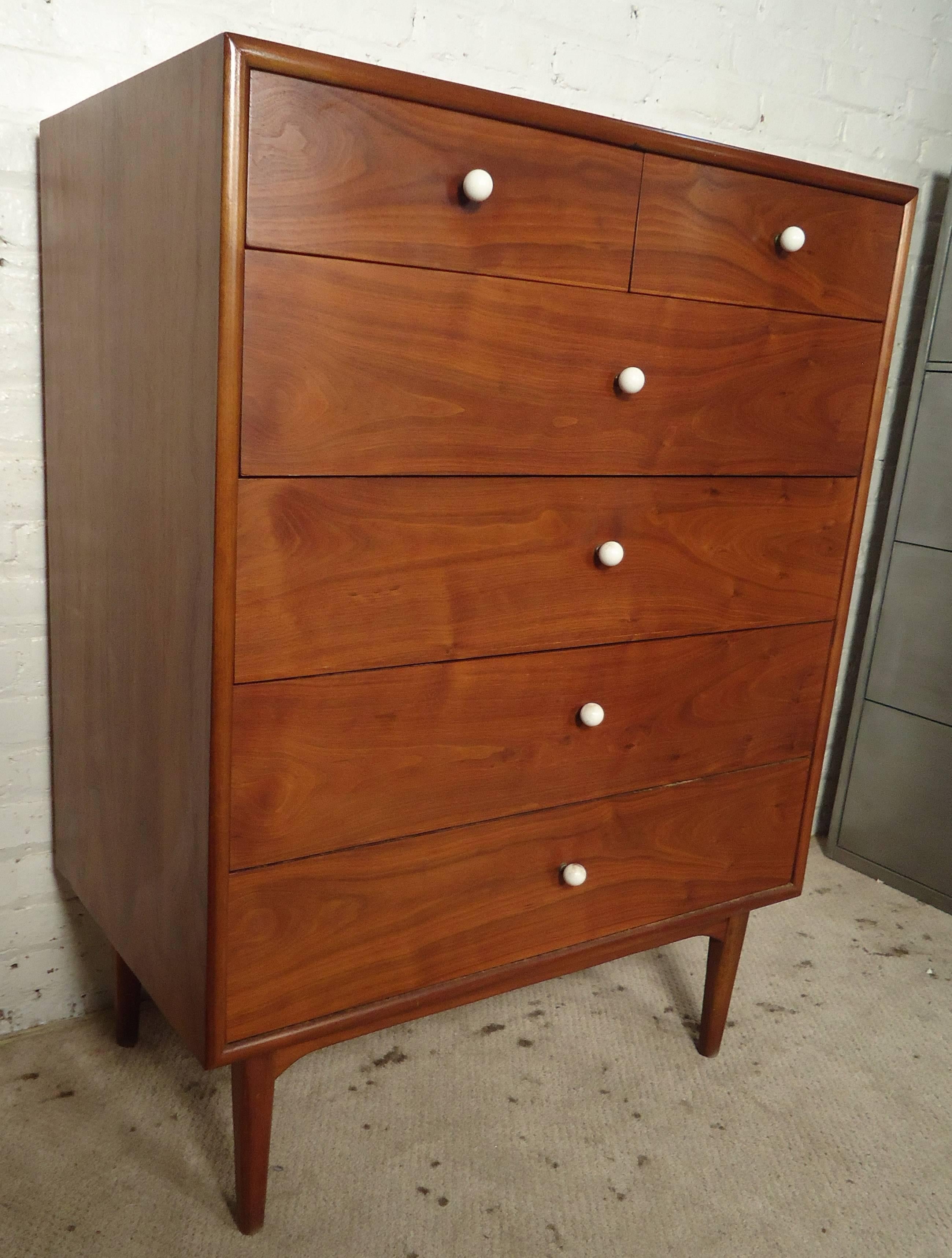 Vintage-modern highboy dresser designed by Kipp Stuart for Drexel, features six drawers and beautiful wood grain.

Please confirm item location NY or NJ with dealer.