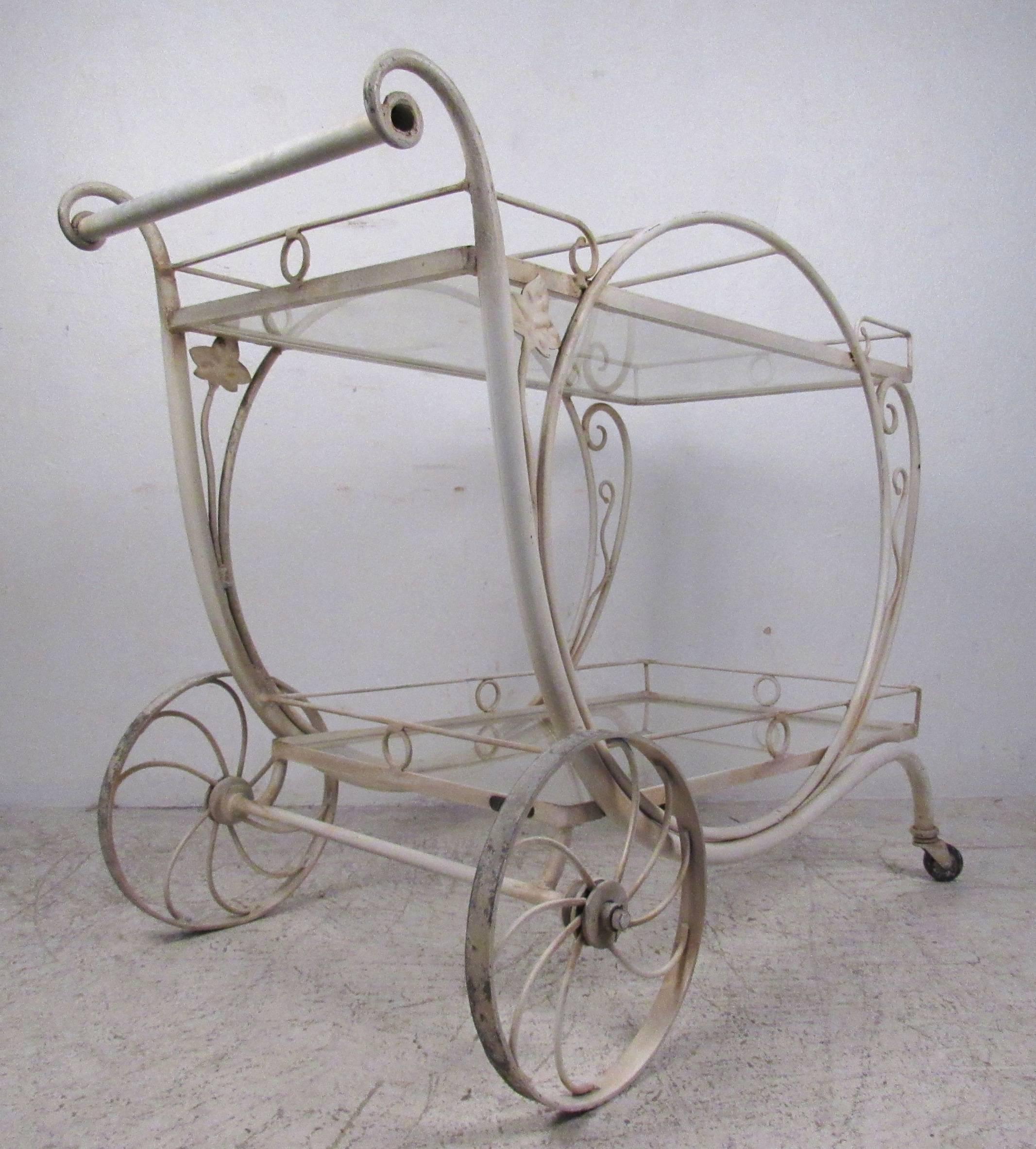 Wrought iron two-tier serving cart by John Salterini. Please confirm item location (NY or NJ) with dealer.