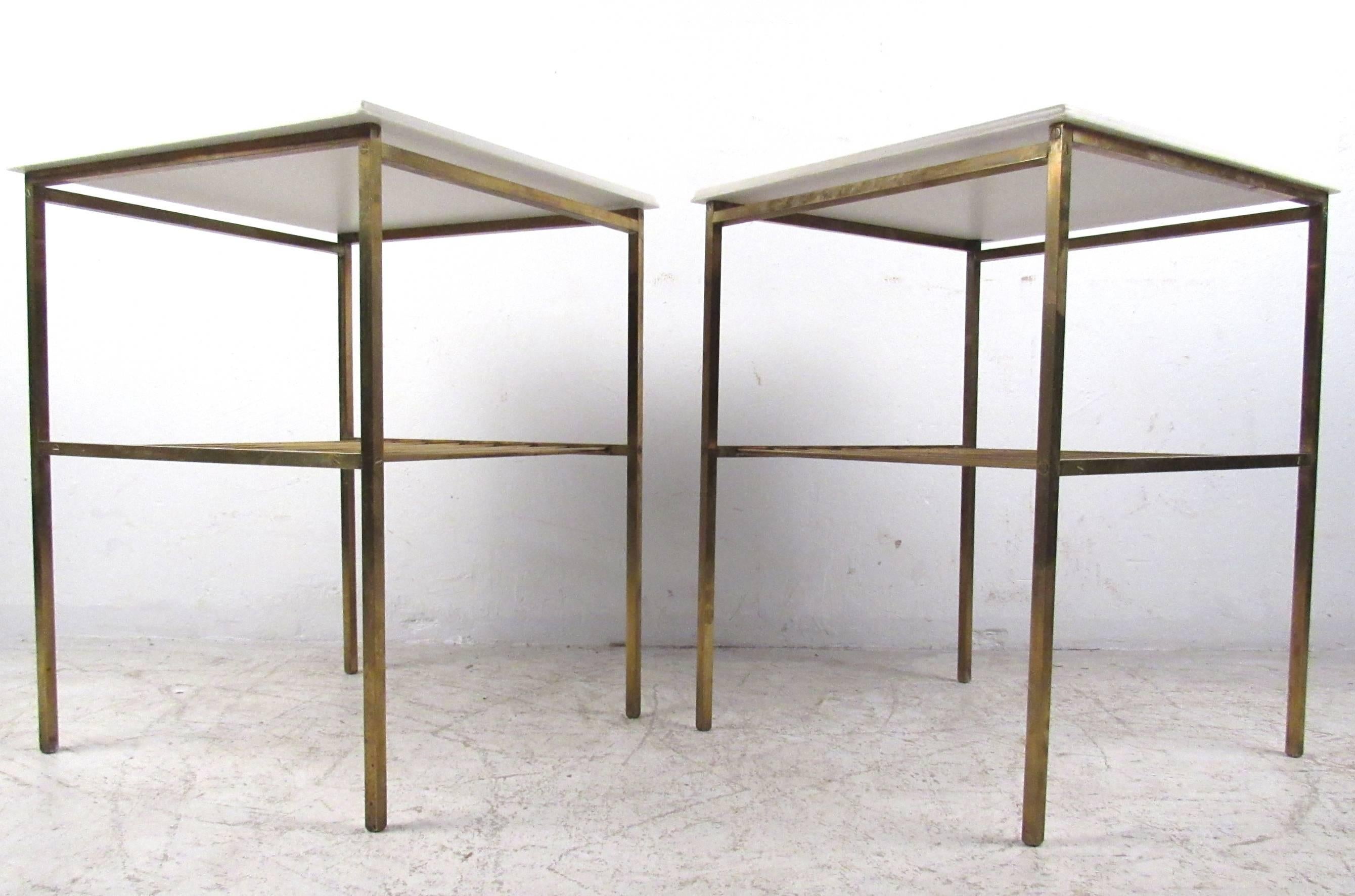This unique pair of vintage end tables features the timeless mid-century style of designer Harvey Probber, and offers a two tier design for added storage capacity. The beveled edge marble composite top adds to it's appeal, please confirm item