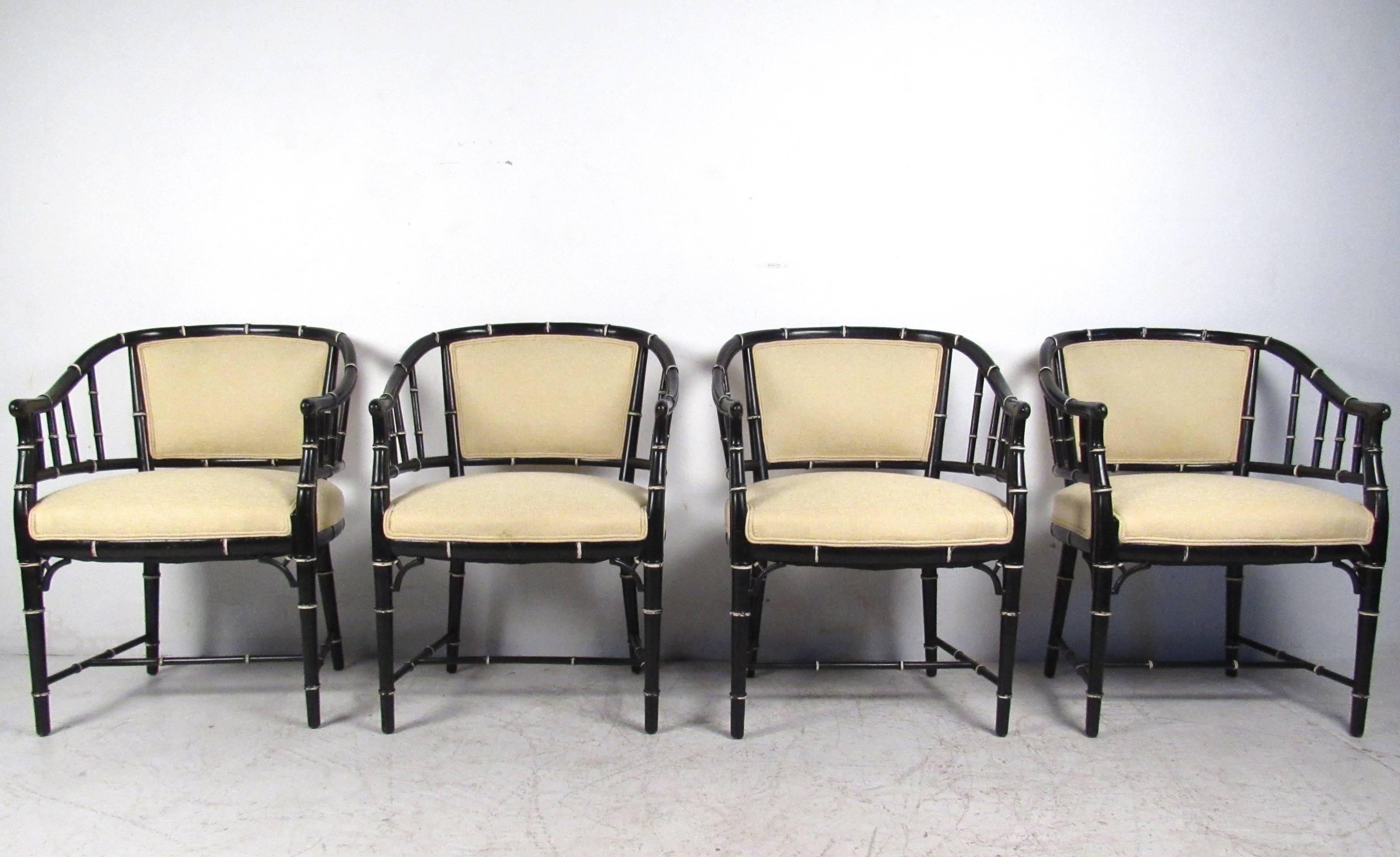 This set of four barrel back dining chairs features unique lacquered bamboo style frames complete with comfortable upholstered seats and backs. Stretchers for added supporter, this stylish set of unusual chairs make an impressive addition to any