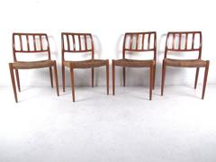 N.O. Møller Teak and Rush Seat Dining Chairs