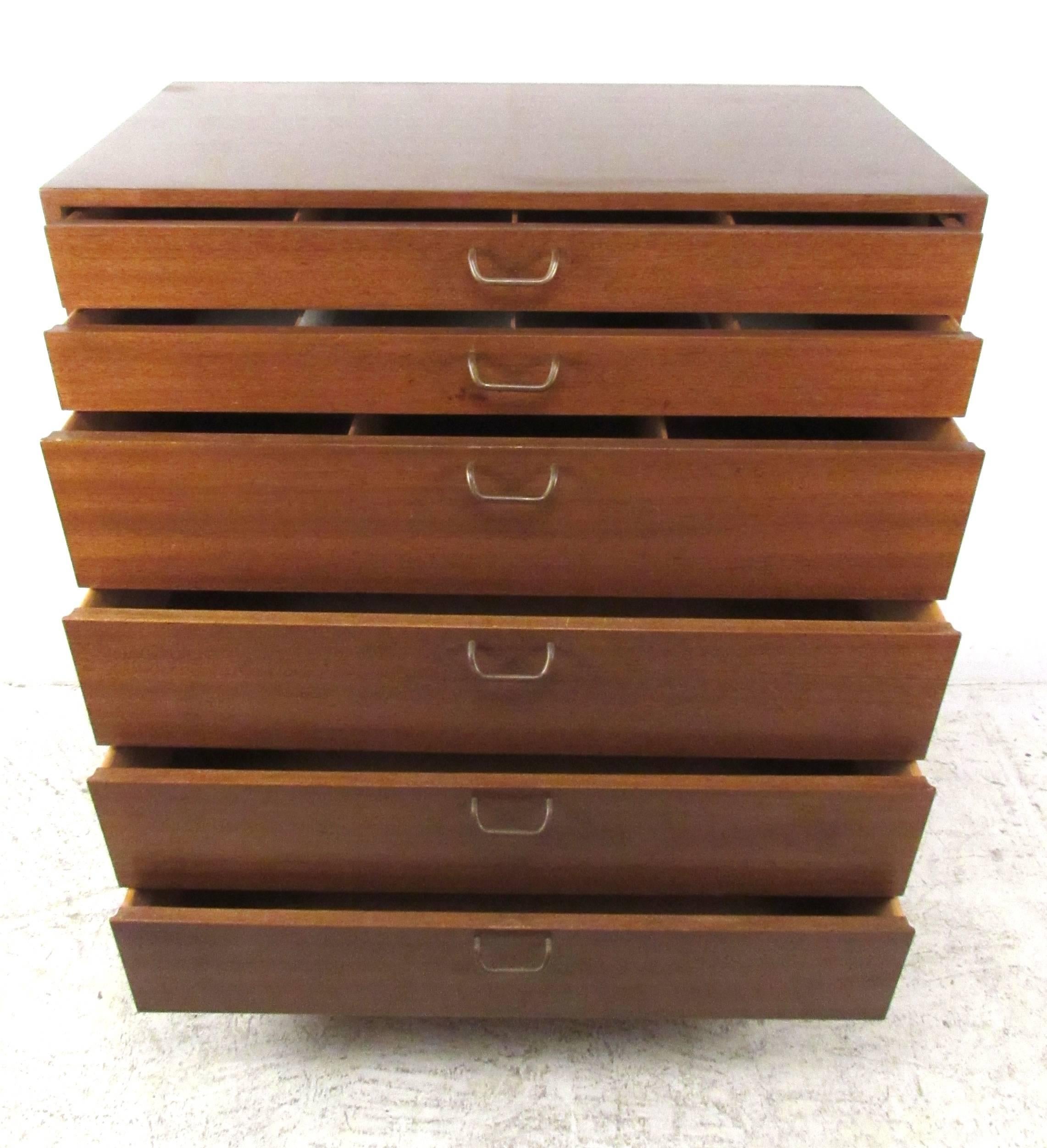 Mahogany six-drawer dresser with brass pulls and two partitioned drawers. Perfect mid-century modern highboy dresser for bedroom storage. Iconic Harvey Probber style drawer pulls, original label in drawer  Please confirm item location (NY or NJ)