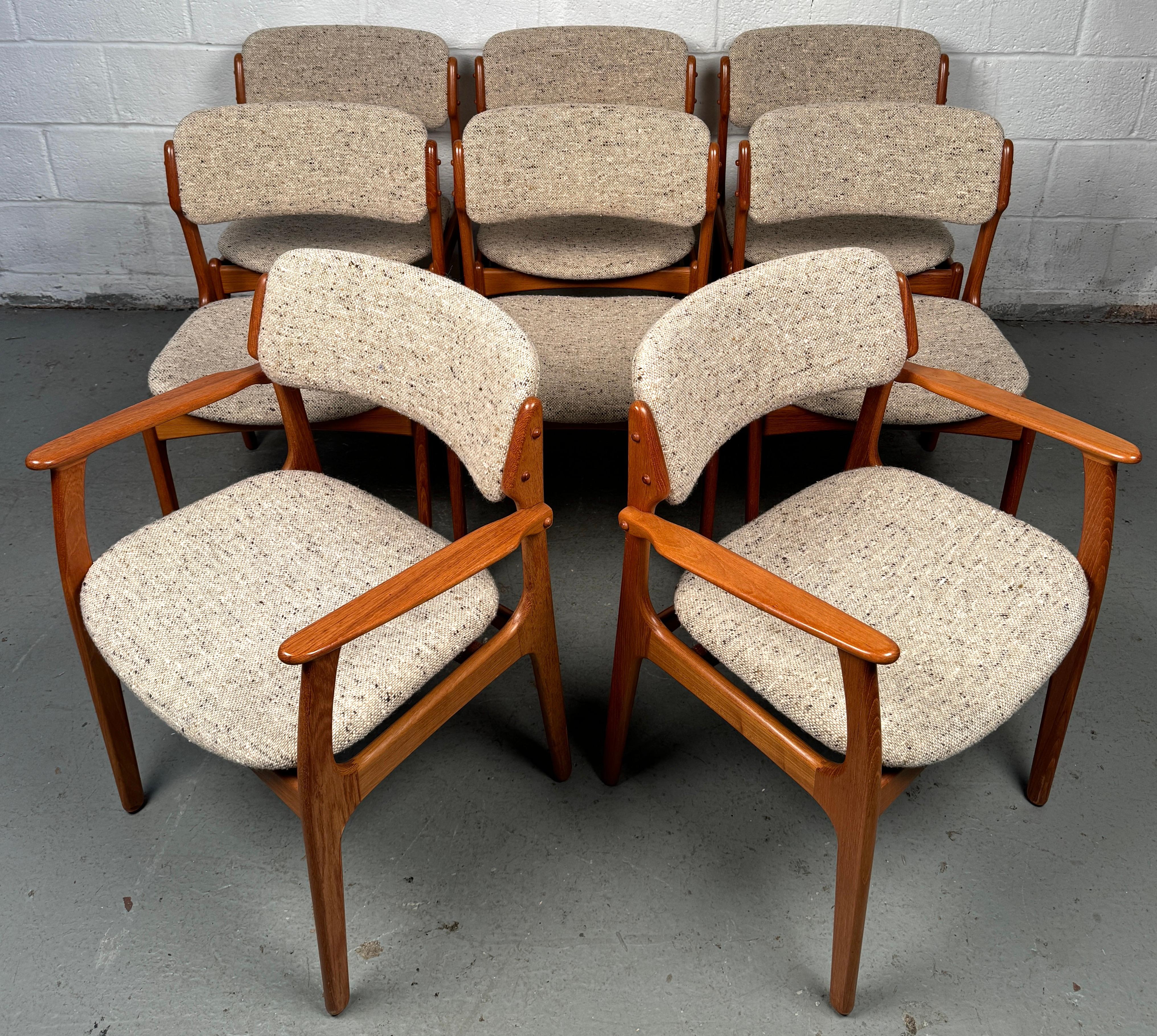 Référence en matière de design moderne danois, cet ensemble de chaises de salle à manger Model 50 du célèbre designer Erik Buch pour O.D. Møbler capture l'essence de l'artisanat scandinave du milieu du siècle : des lignes organiques, une menuiserie