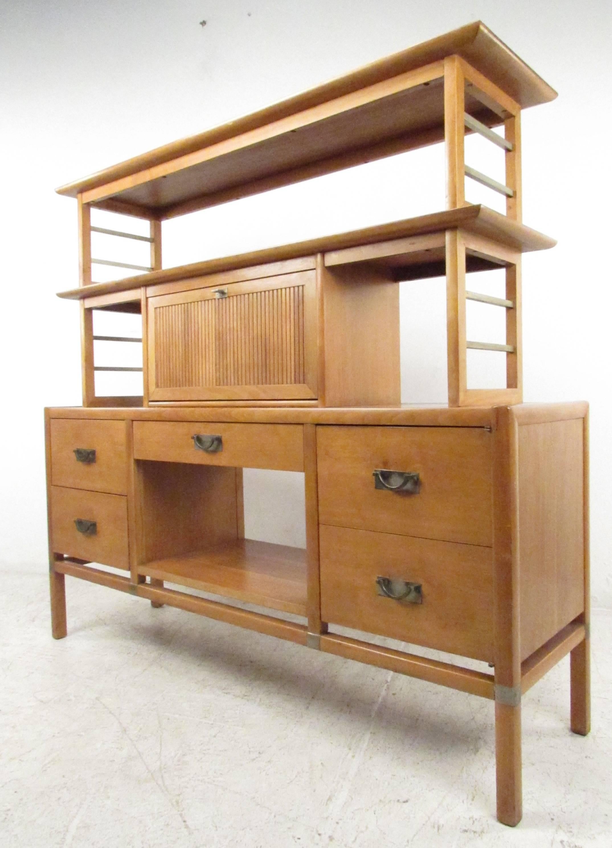 Unique desk or bookcase wall unit with drop down writing surface, multiple storage drawers, with open shelf space. Can be used as a desk, a server/sideboard or as a service station in a restaurant. Please confirm item location (NY or NJ) with