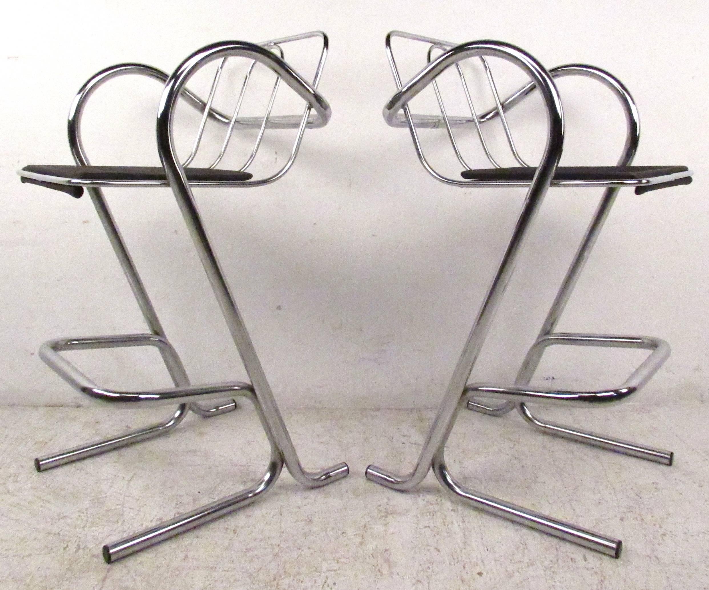 Set of four tubular metal stools in polished chrome finish. Designed by Jerry Johnson with bent chrome shaping.
Please confirm item location (NY or NJ) with dealer.
    