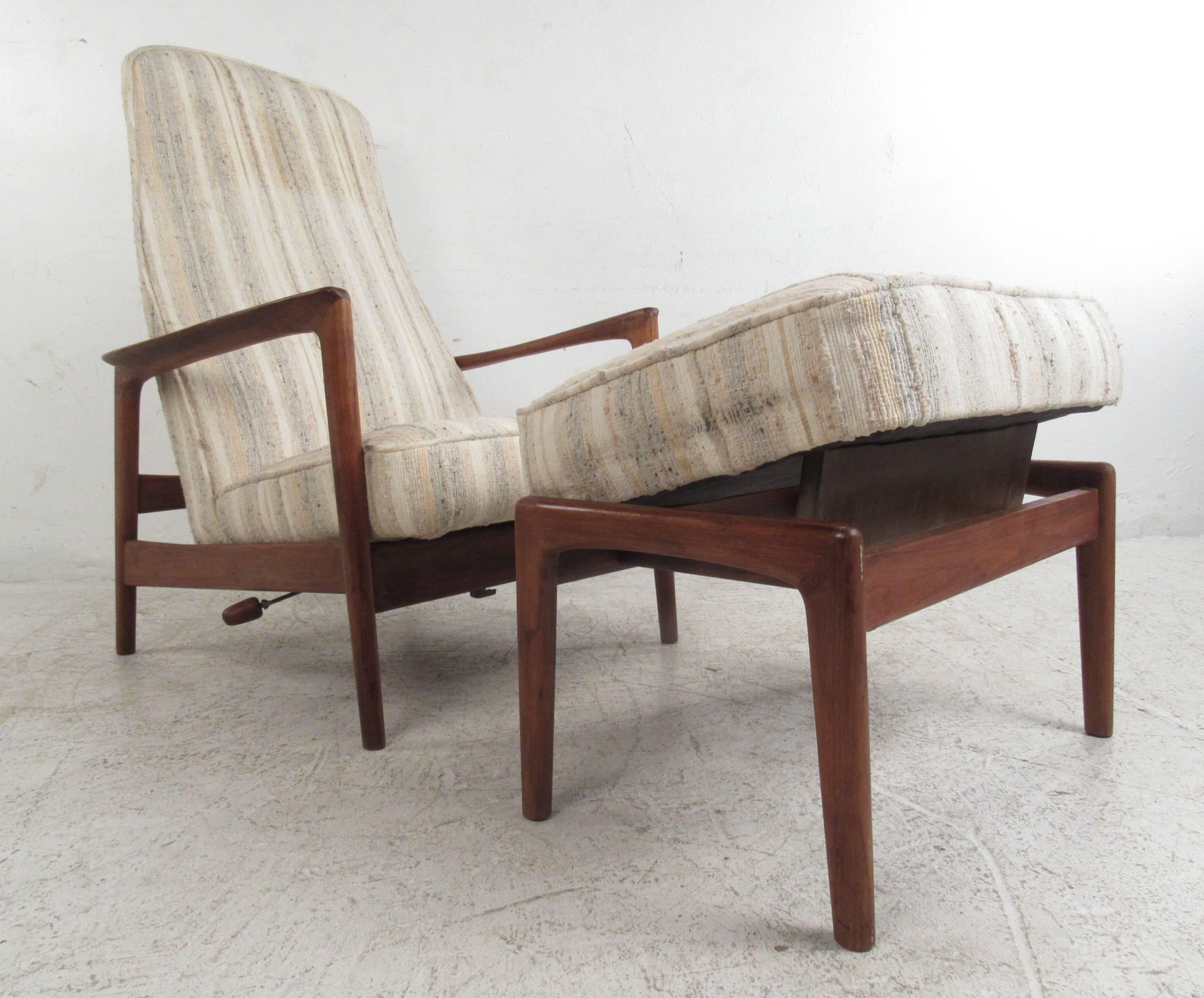 Vintage Scandinavian modern high back reclining lounge chair and ottoman designed by Folke Ohlsson for DUX. Please confirm item location (NY or NJ) with dealer.