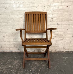 Set of Four Outdoor Folding Teak Lounge Chairs