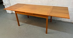 Mid-century Modern Danish Teak Draw Leaf Dining Table