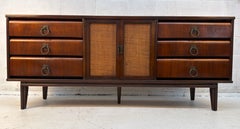 Mid-Century Modern Walnut and Cane Nine Drawer Dresser