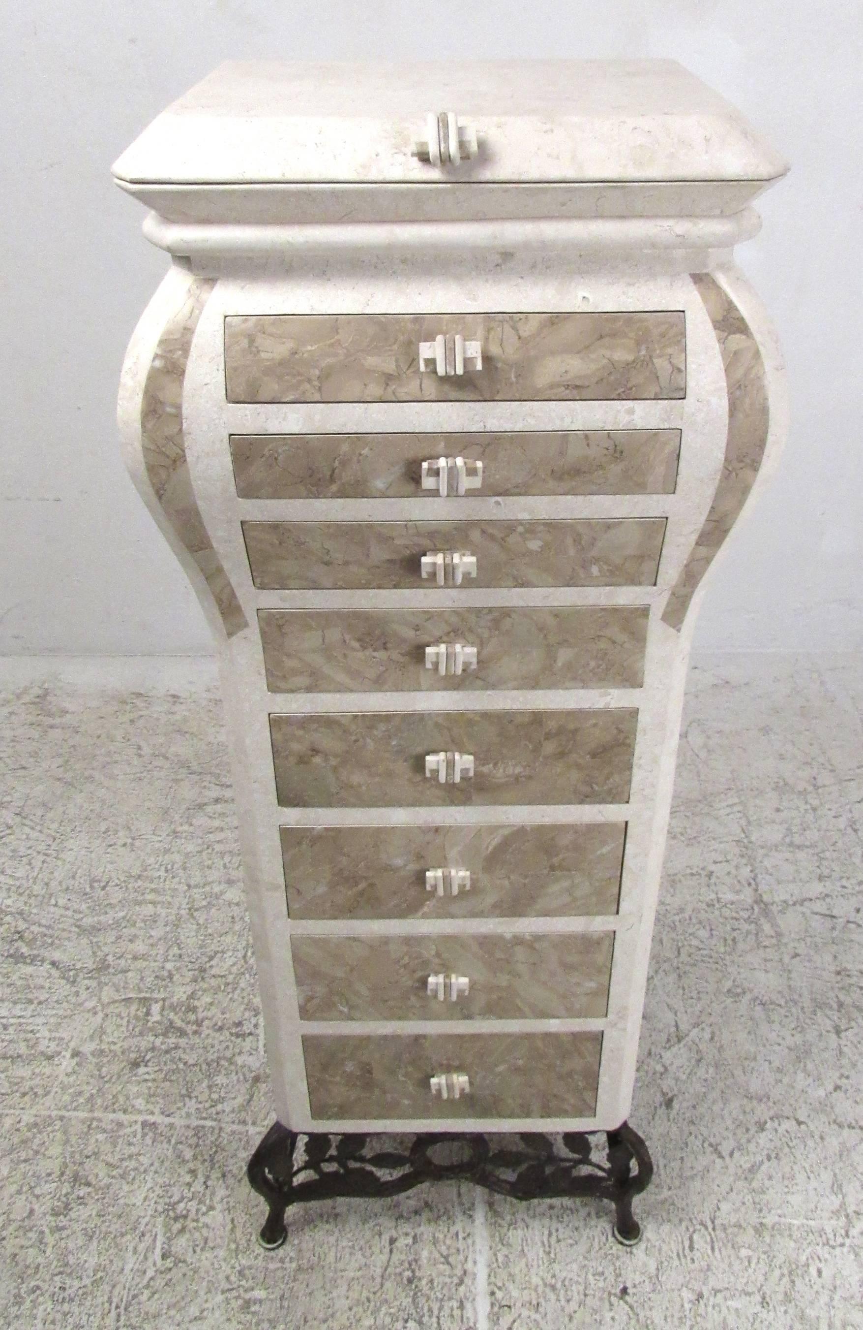 Beautifully detailed eight-drawer jewelry tower in tessellated stone. Featuring felt lined graduated drawers, carved pulls, and a mirrored hinged lid. Please confirm item location (NY or NJ) with dealer.