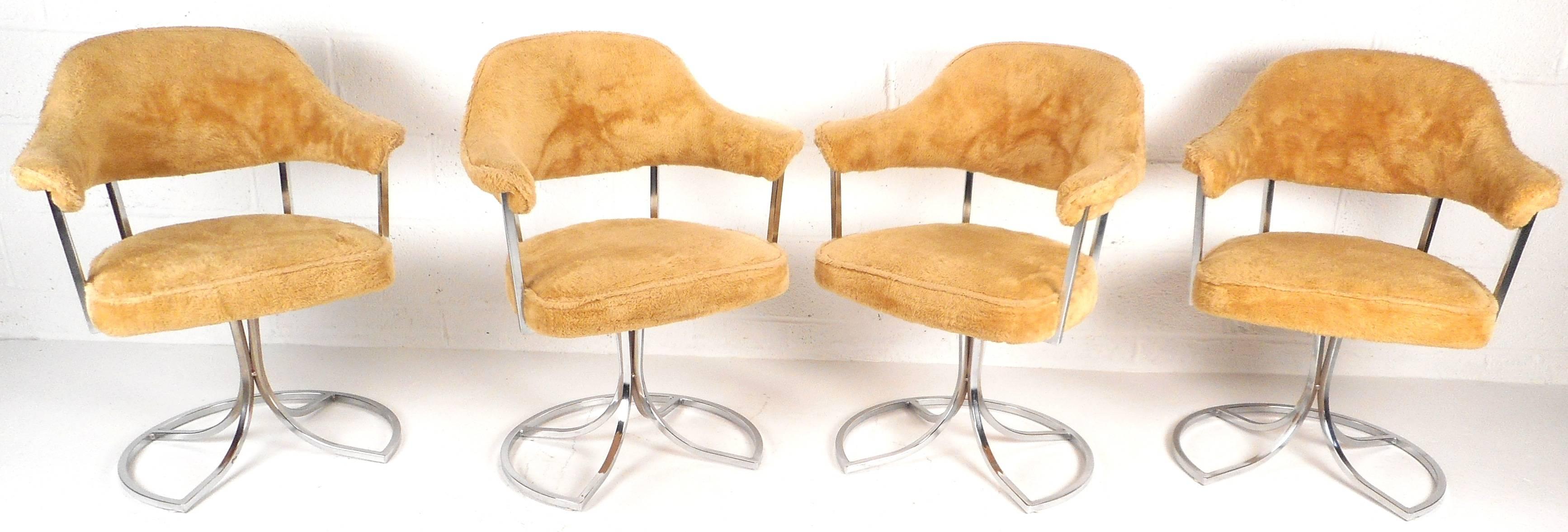 Stunning Mid-Century Modern set of four tulip chairs by Cal-Style Furniture. Unique sculpted chrome swivel base, vintage gold fabric and comfortable barrel back seats make this vintage set of kitchen or occasional chairs a stylish addition to any