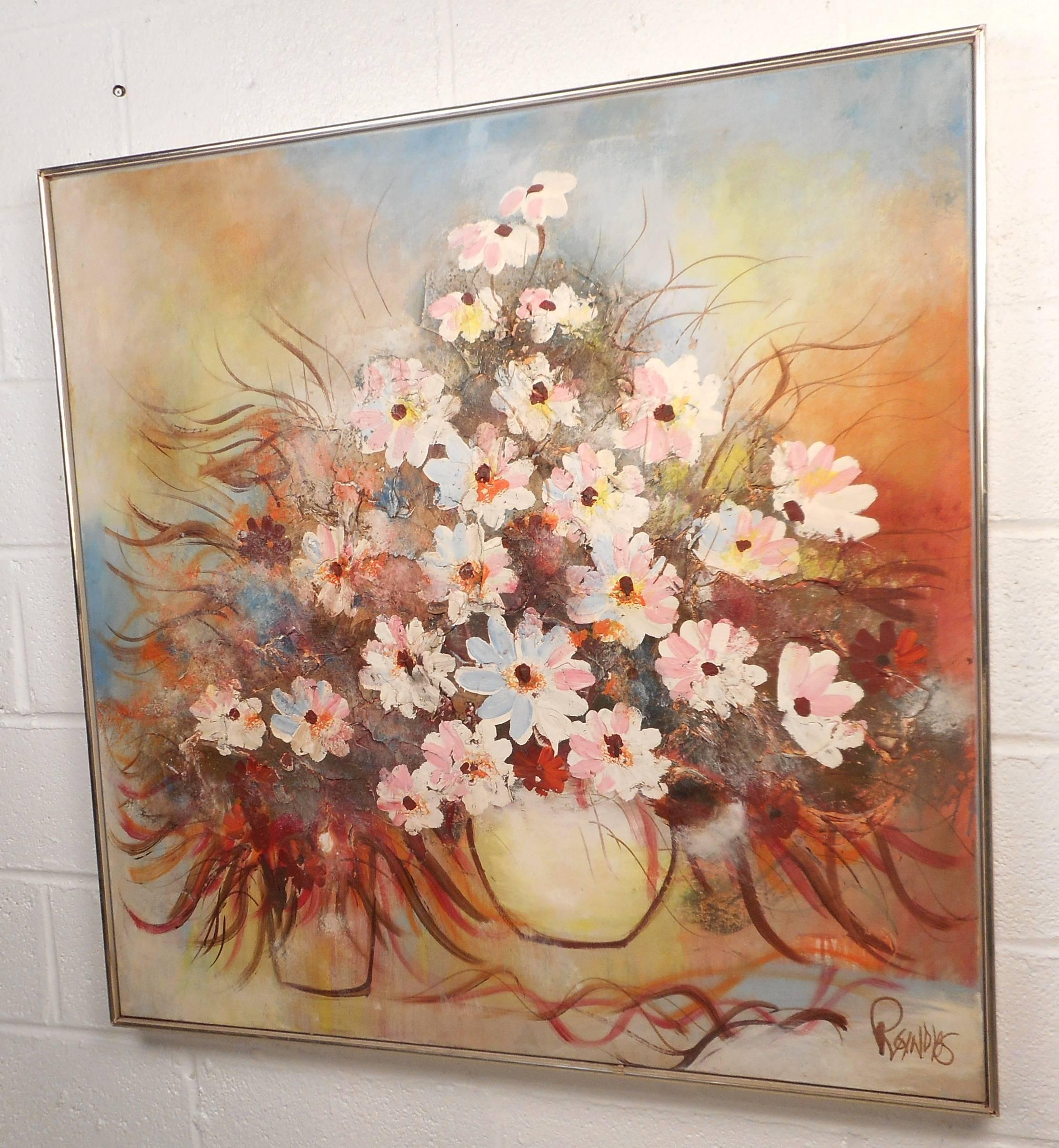 Gorgeous Mid-Century Modern painting features an abundance of flowers in a vase. The eloquent use of colors and sleek metal frame are sure to add style to any modern interior. (Signature by artist is illegible). Please confirm item location (NY or