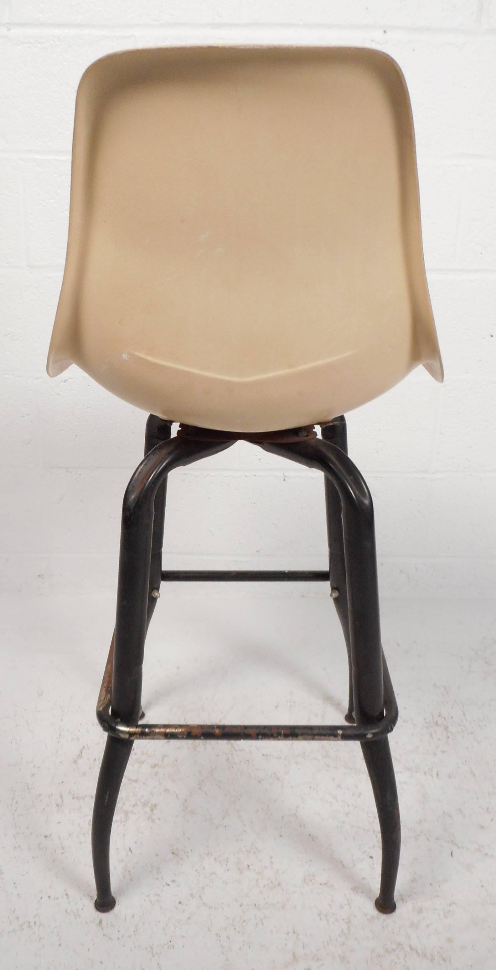 Late 20th Century Set of Mid-Century Modern Plastic and Iron Swivel Bar Stools